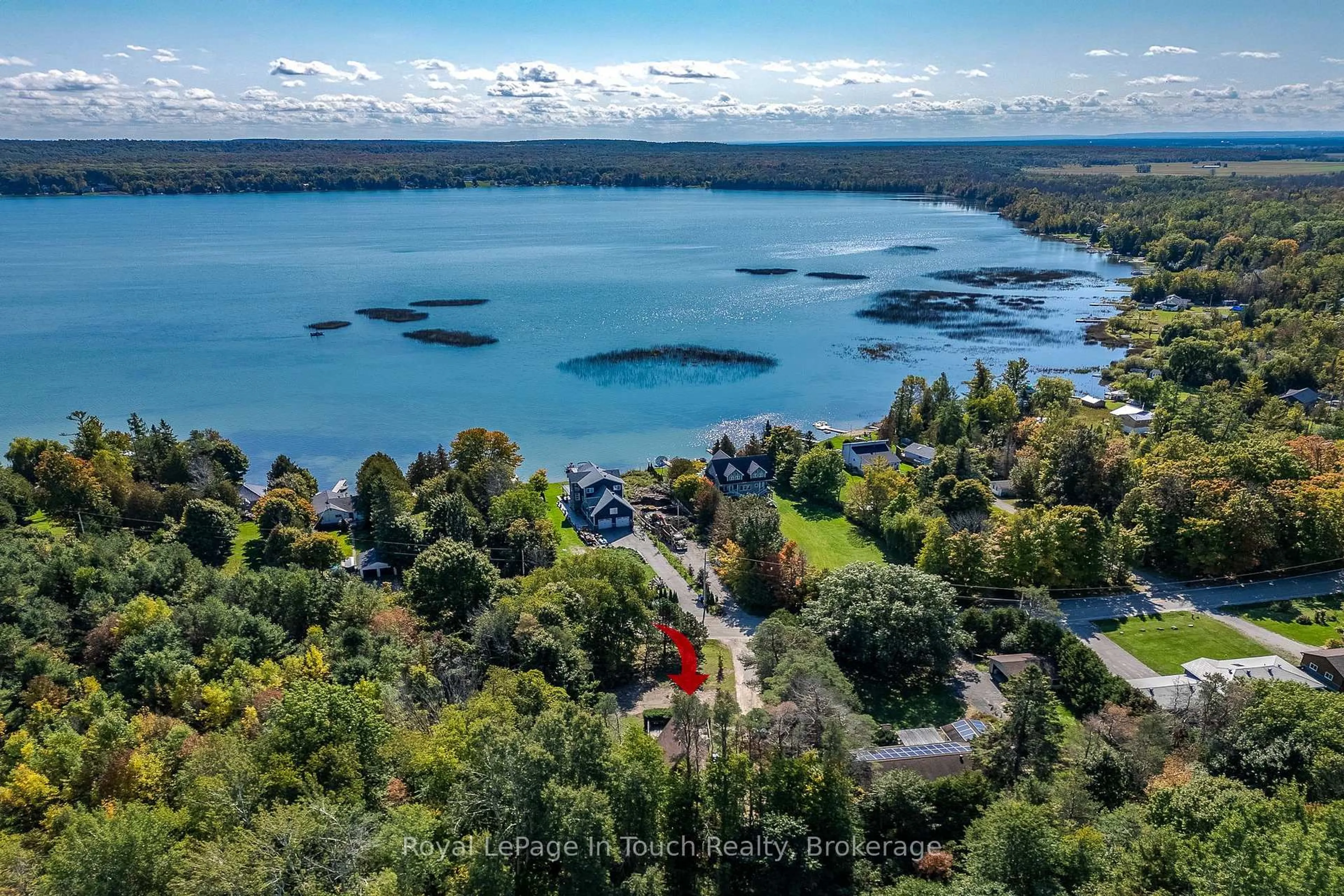 A pic from outside/outdoor area/front of a property/back of a property/a pic from drone, water/lake/river/ocean view for 2170 North Orr Lake Rd, Springwater Ontario L0L 1P0