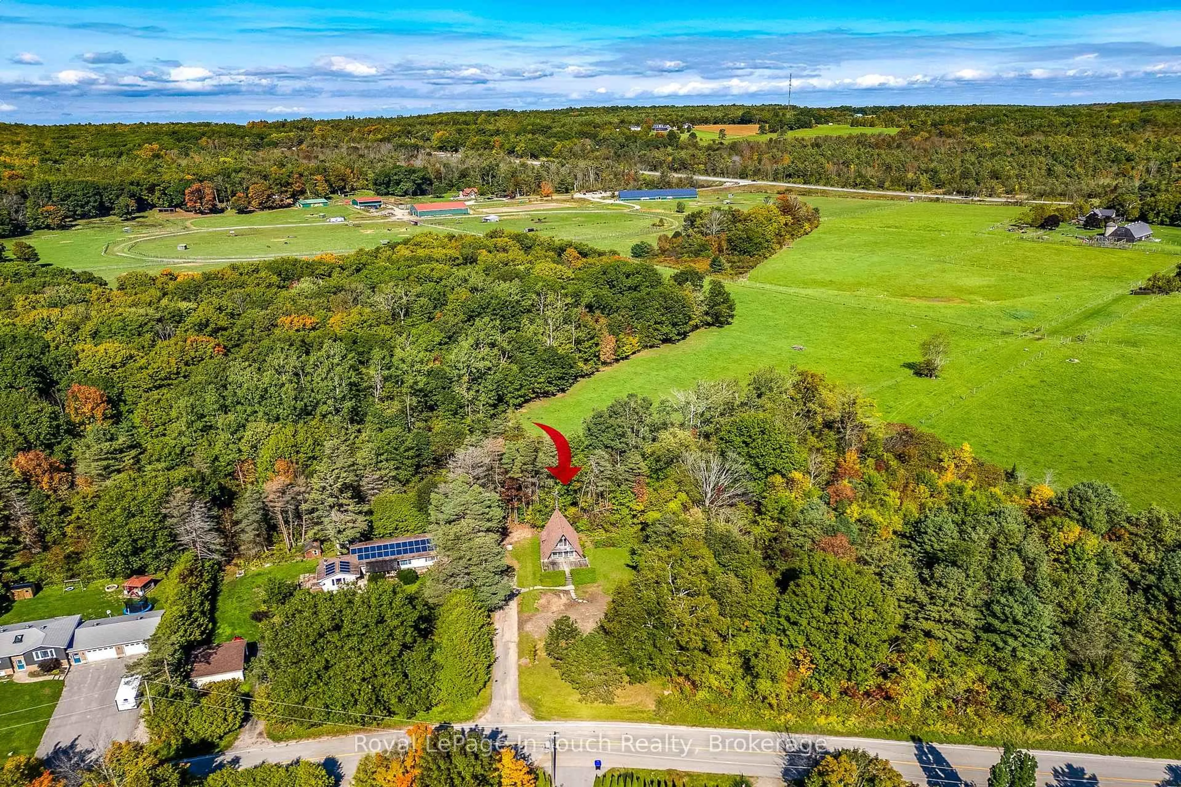 A pic from outside/outdoor area/front of a property/back of a property/a pic from drone, water/lake/river/ocean view for 2170 North Orr Lake Rd, Springwater Ontario L0L 1P0