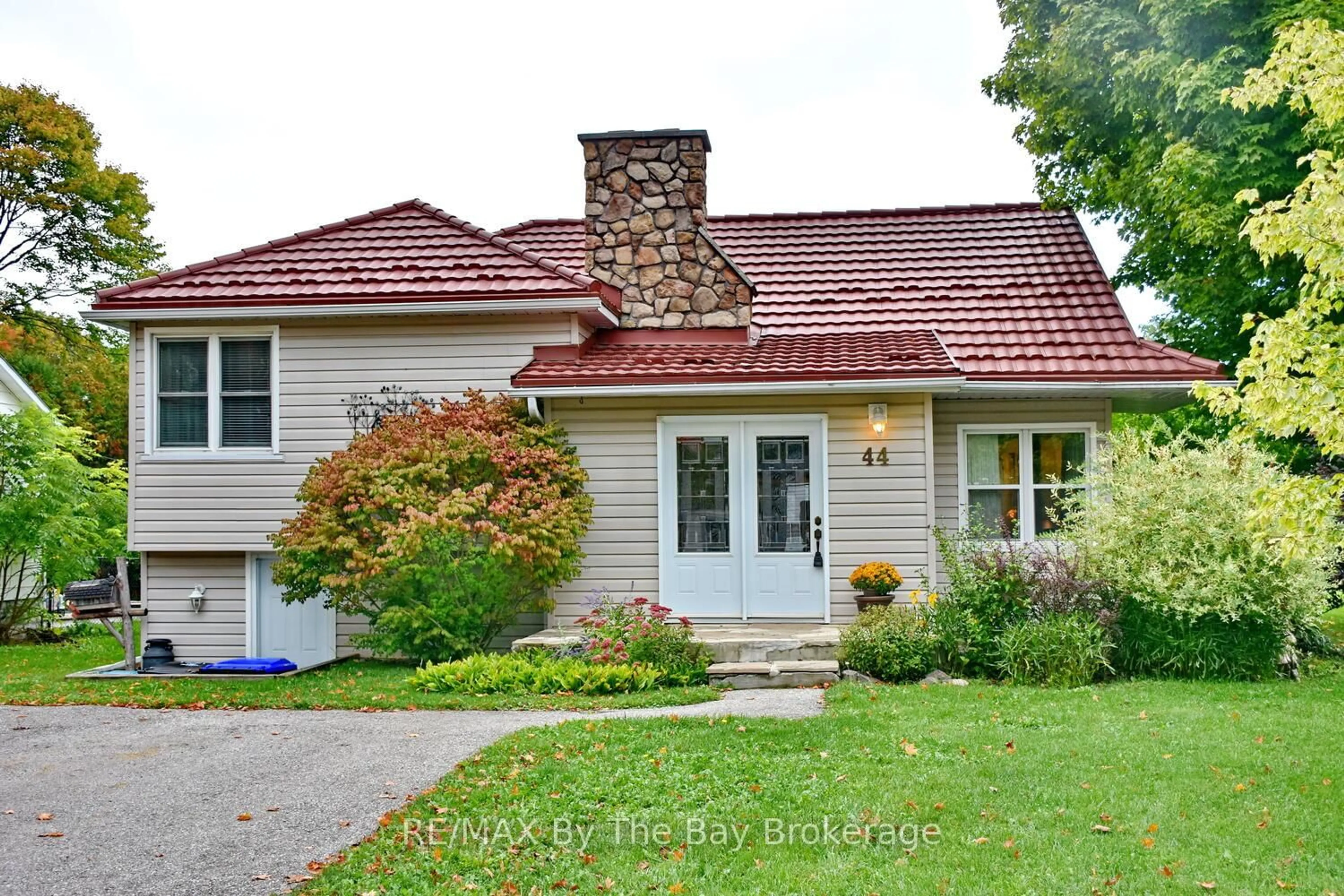Home with brick exterior material, street for 44 Peter St, Springwater Ontario L0L 1P0