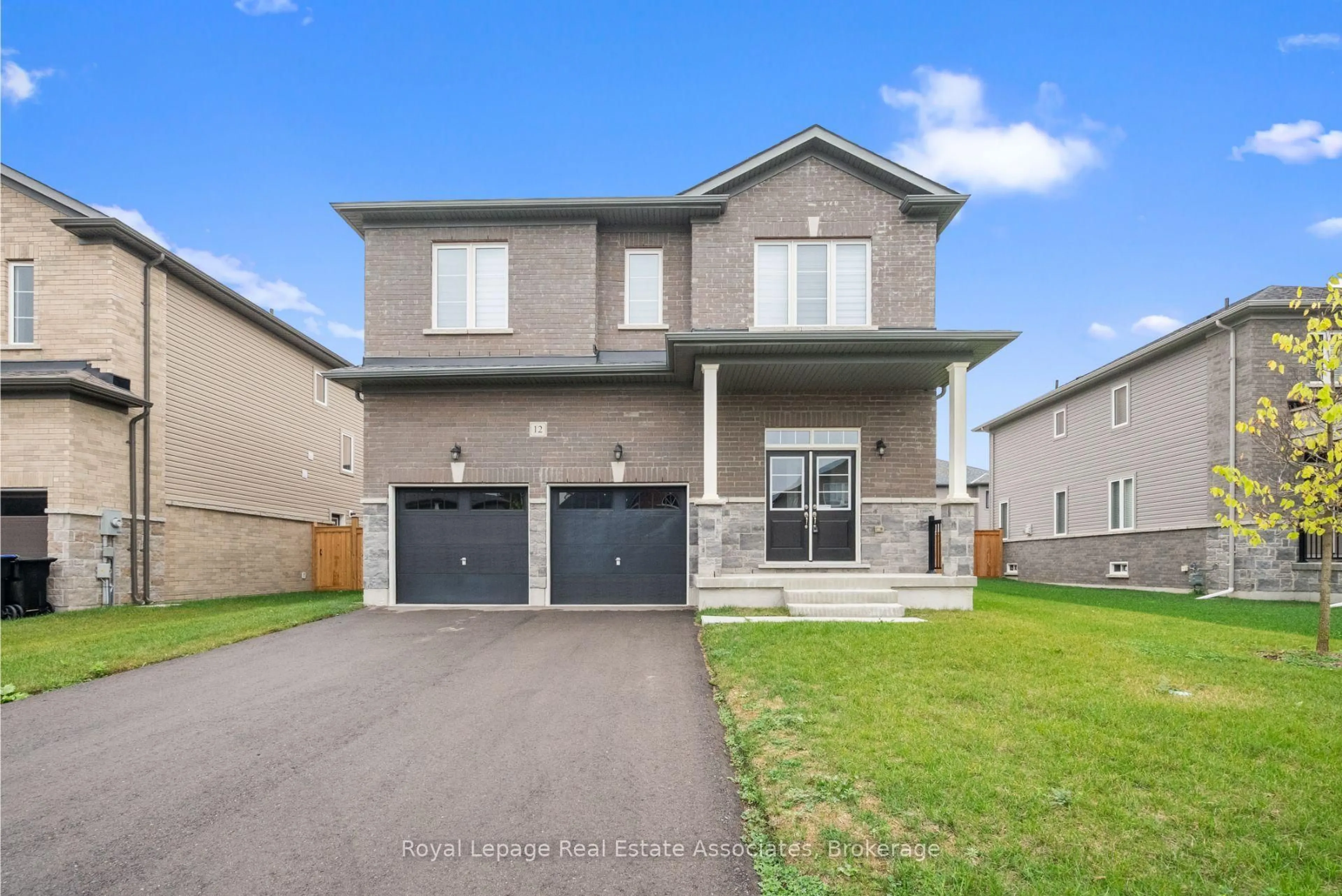 Home with brick exterior material, street for 12 Emerald St, Wasaga Beach Ontario L9Z 0K8