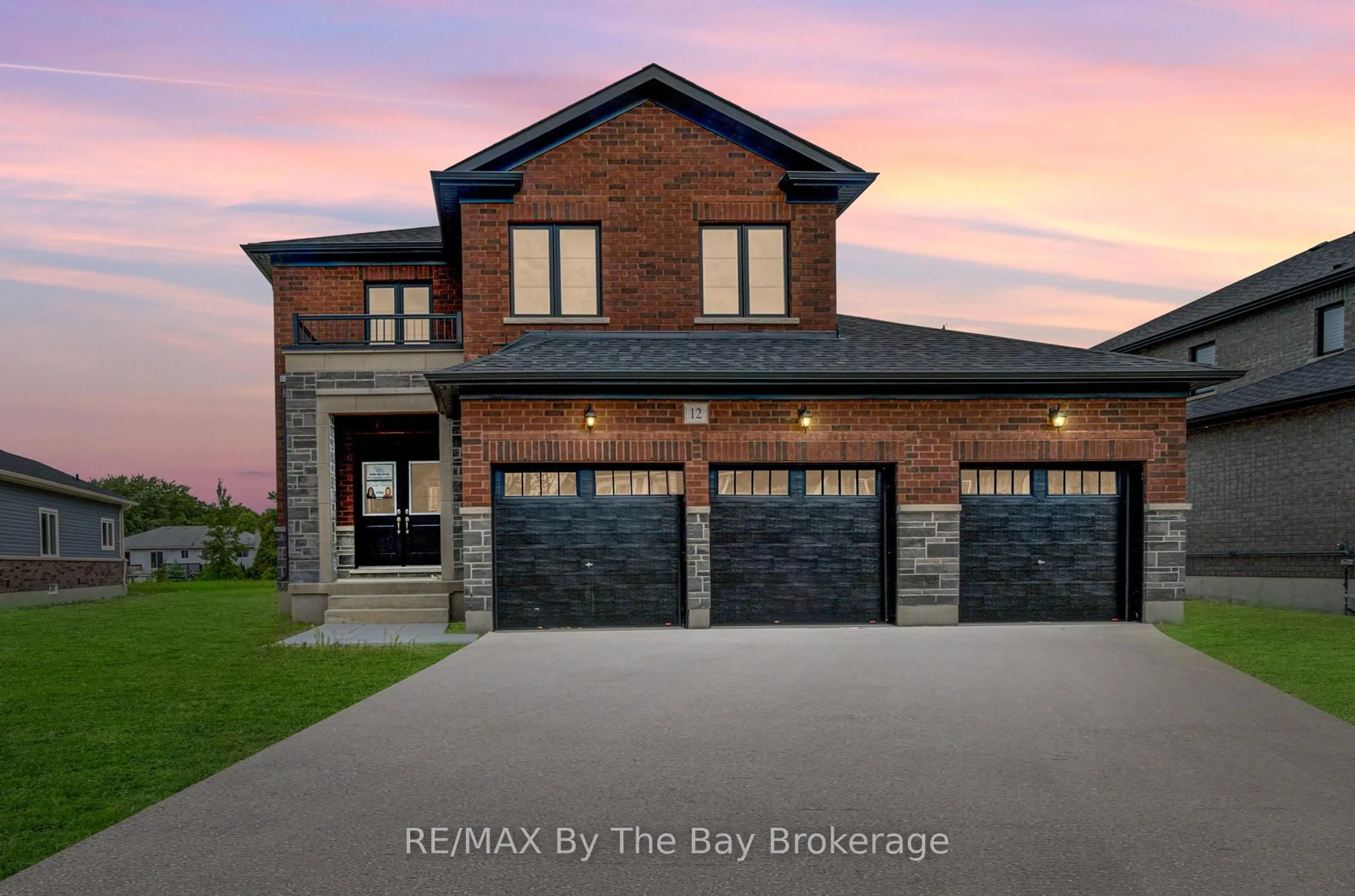 Home with brick exterior material, building for 12 Misty Ridge Rd, Wasaga Beach Ontario L9Z 0R8