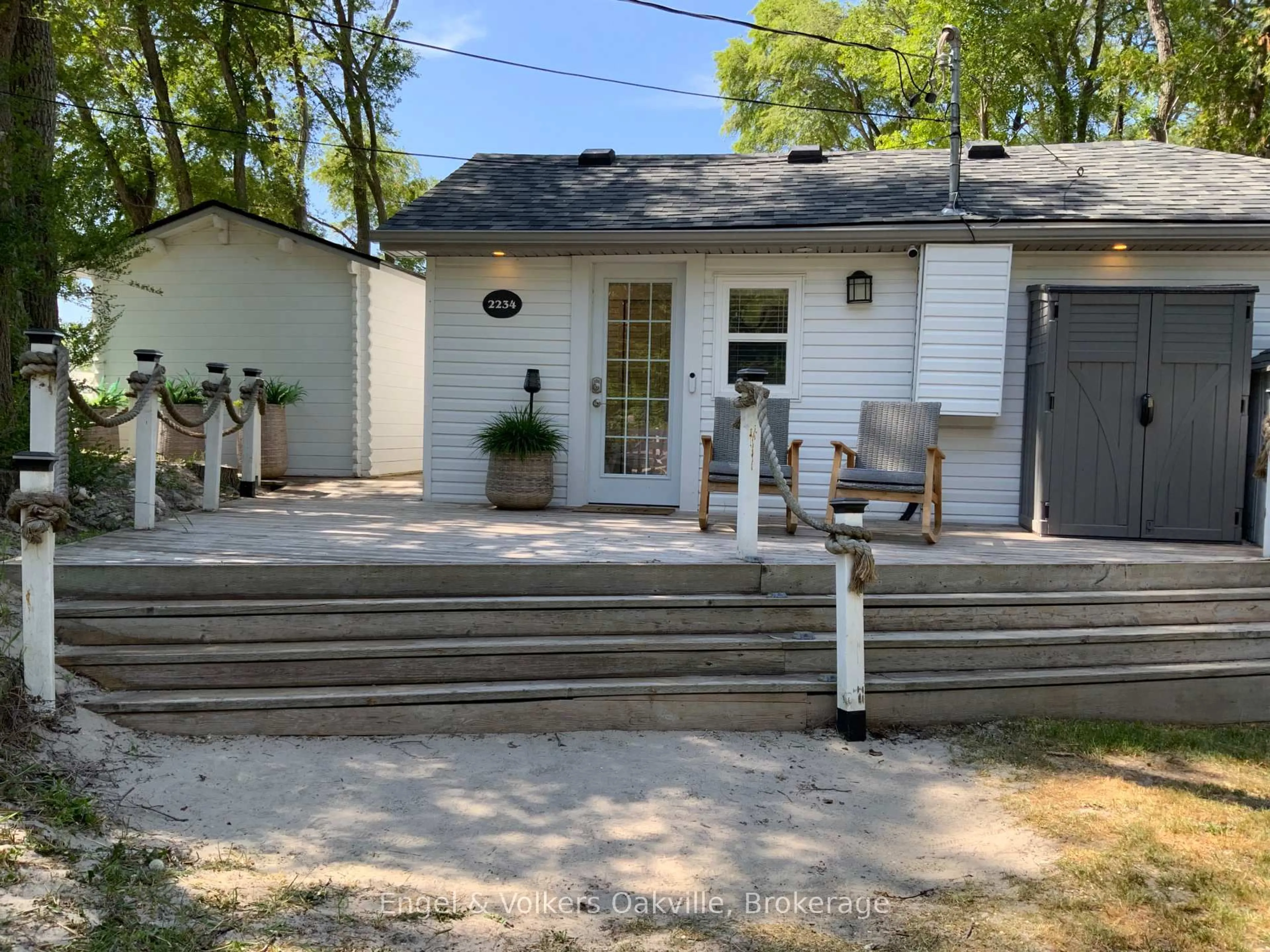 A pic from outside/outdoor area/front of a property/back of a property/a pic from drone, street for 2234 Tiny Beaches  Rd, Tiny Ontario L0L 1P1