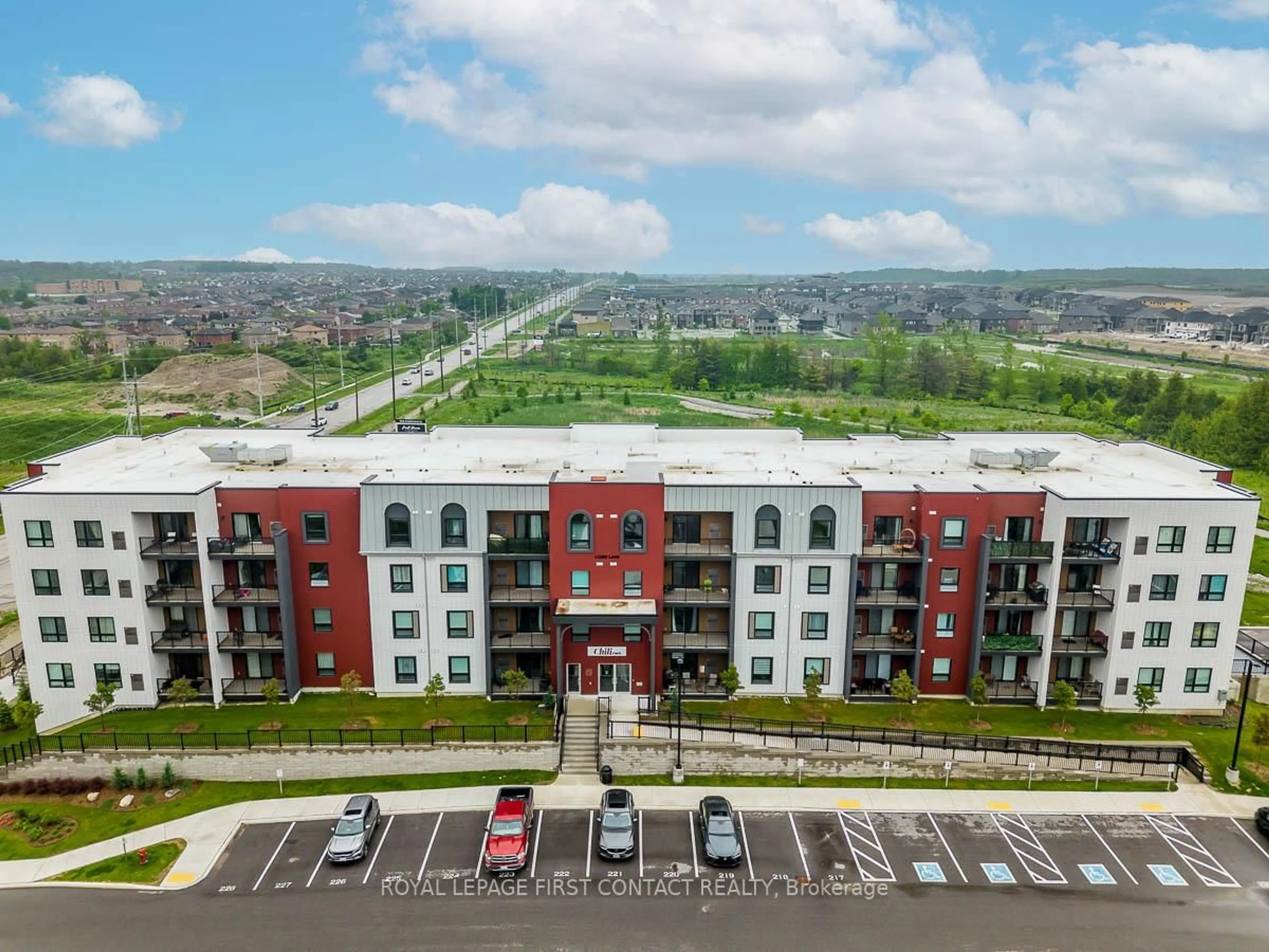 A pic from outside/outdoor area/front of a property/back of a property/a pic from drone, unknown for 1 CHEF Lane #207, Barrie Ontario L9J 0T1