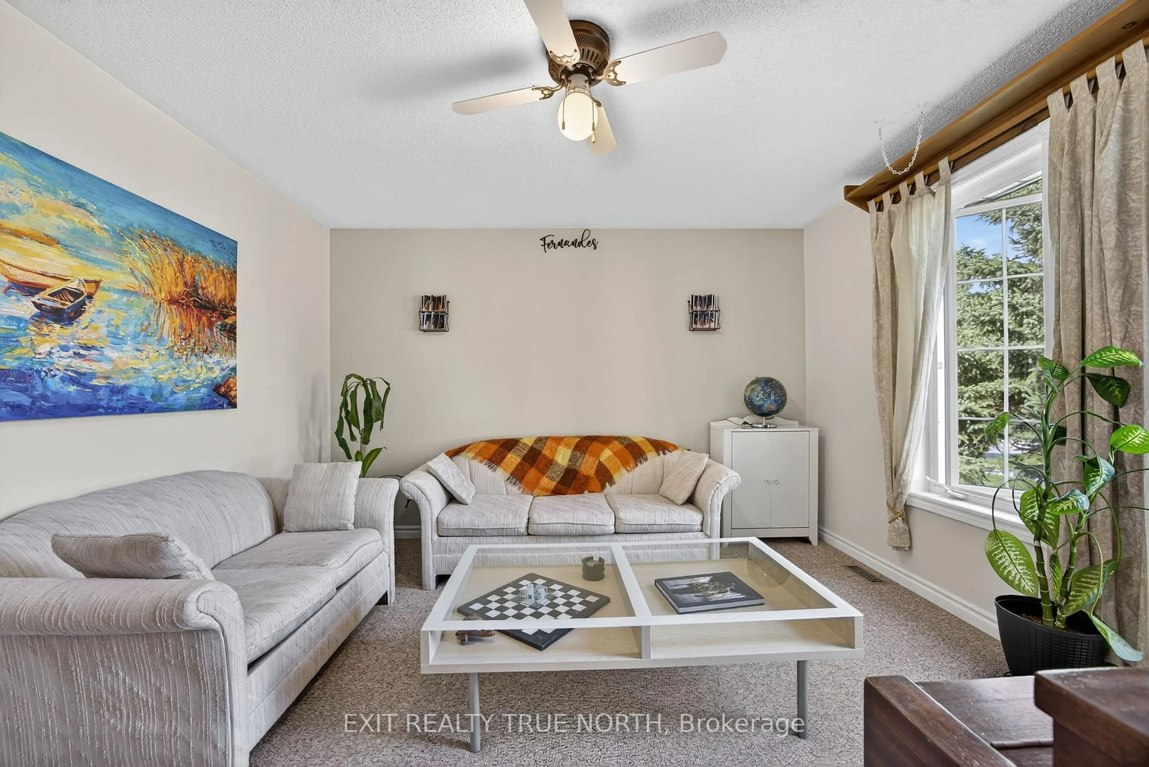 Living room with furniture, unknown for 165 Ritchie Cres, Springwater Ontario L0L 1P0