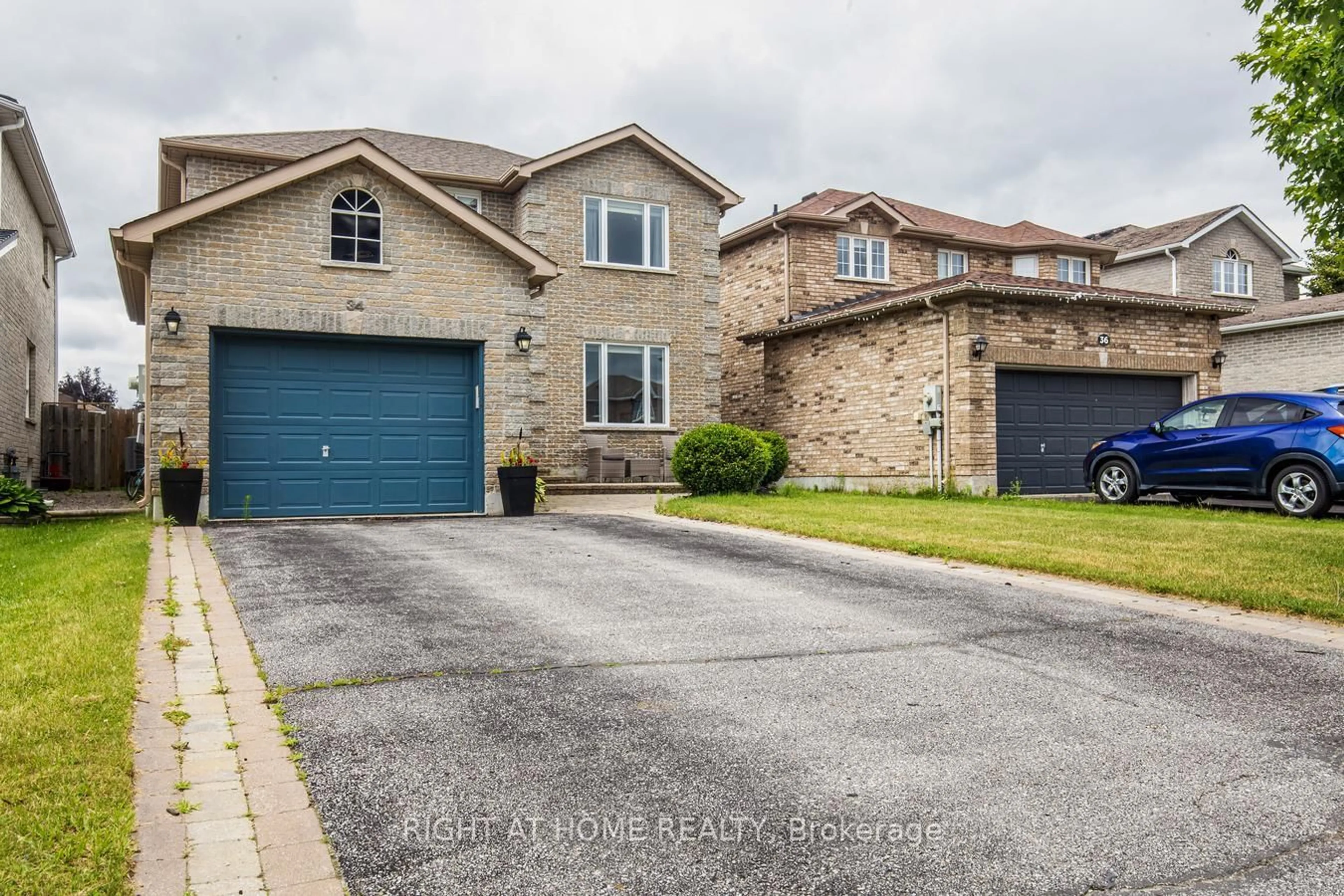 Home with brick exterior material, street for 34 Lang Dr, Barrie Ontario L4N 0W3