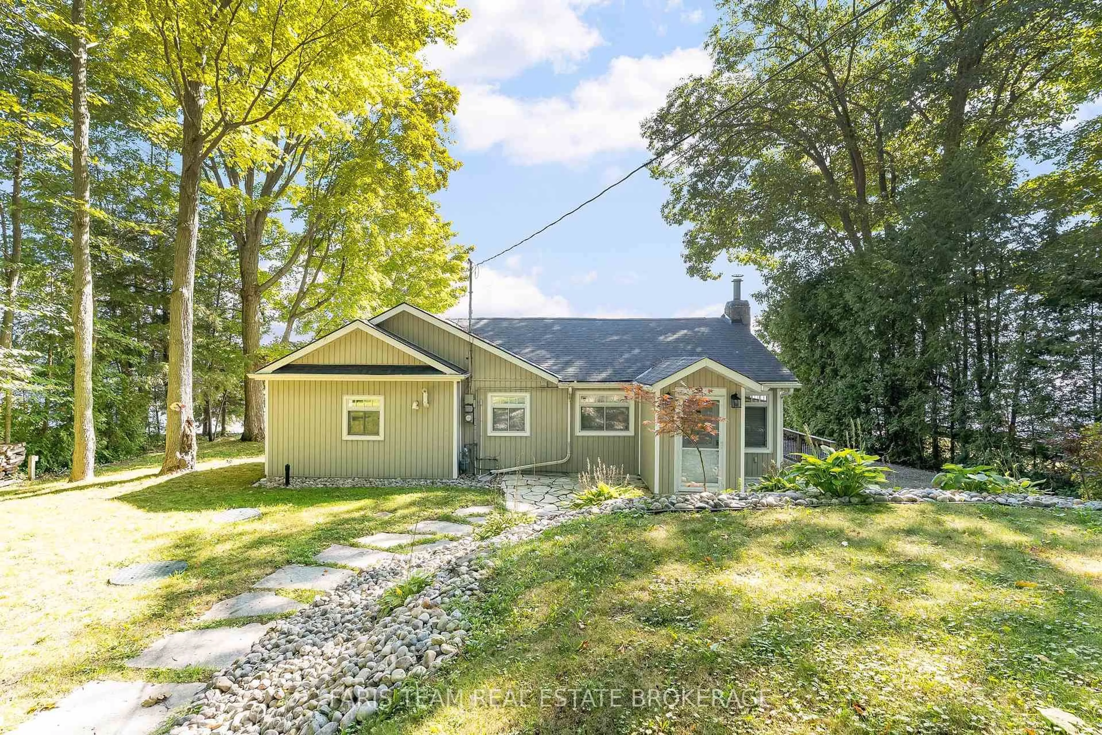 Home with vinyl exterior material, street for 1449 Champlain Rd, Tiny Ontario L9M 0C1