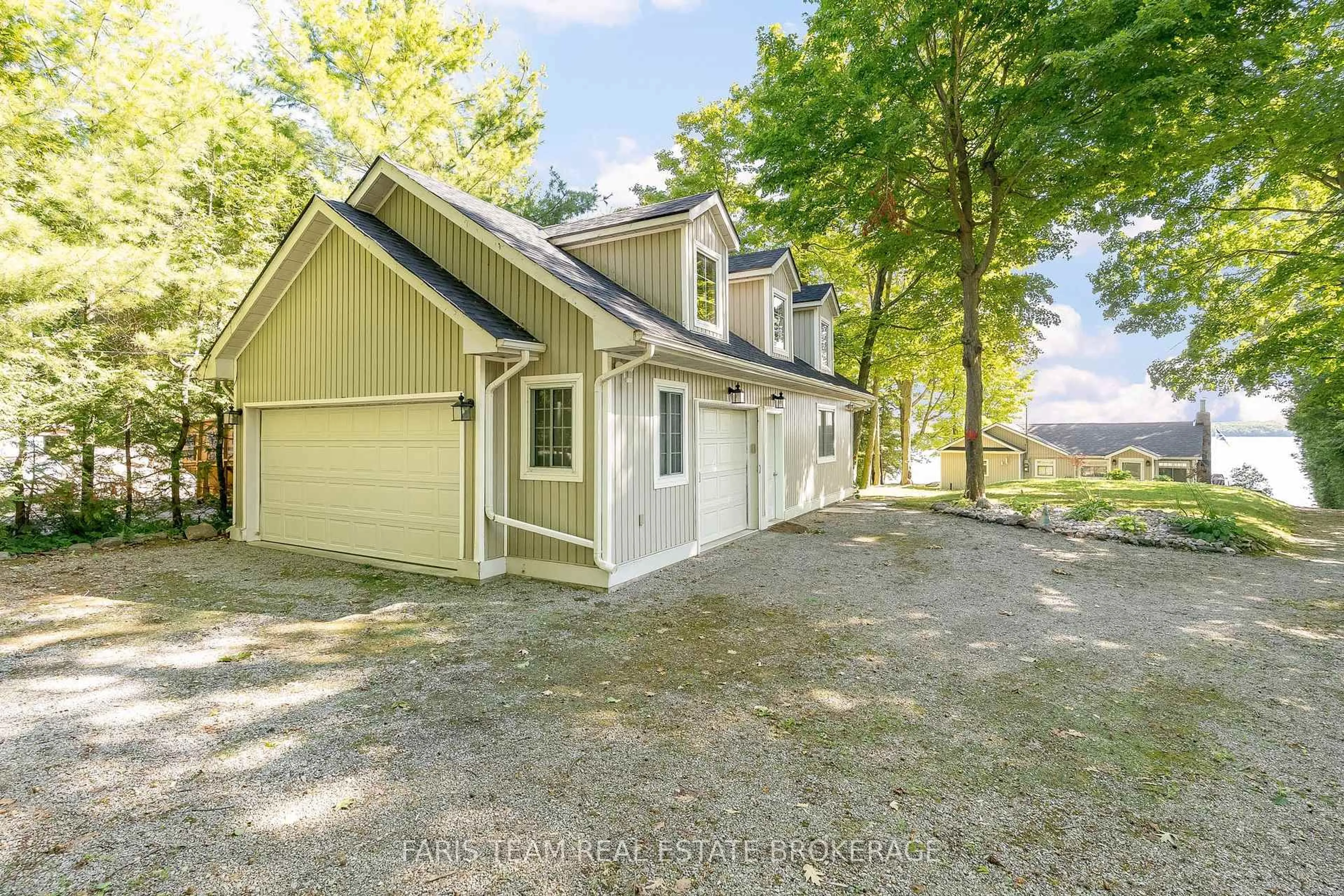 A pic from outside/outdoor area/front of a property/back of a property/a pic from drone, unknown for 1449 Champlain Rd, Tiny Ontario L9M 0C1