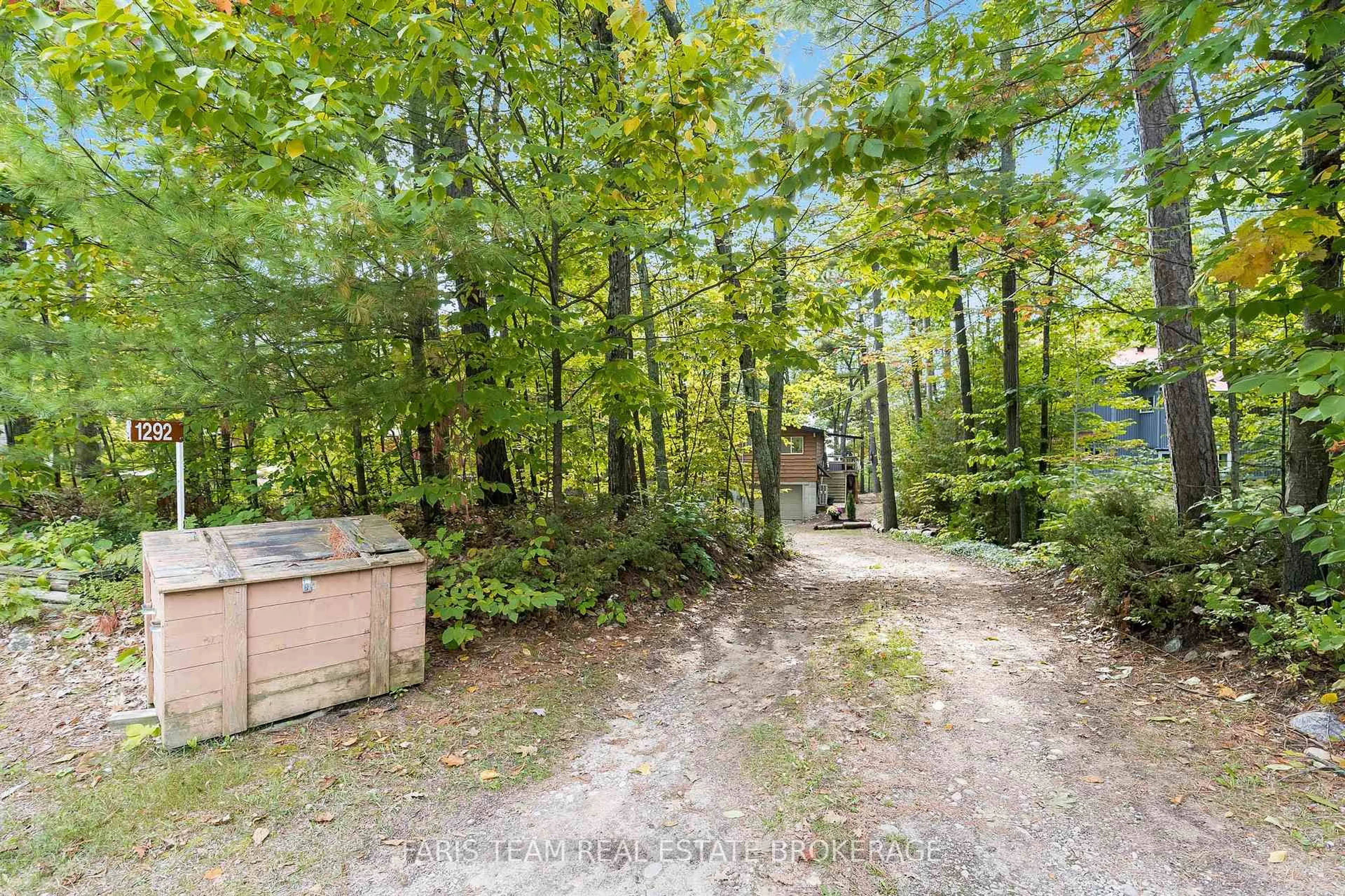 A pic from outside/outdoor area/front of a property/back of a property/a pic from drone, forest/trees view for 1292 Tiny Beaches Rd, Tiny Ontario L9M 0H3