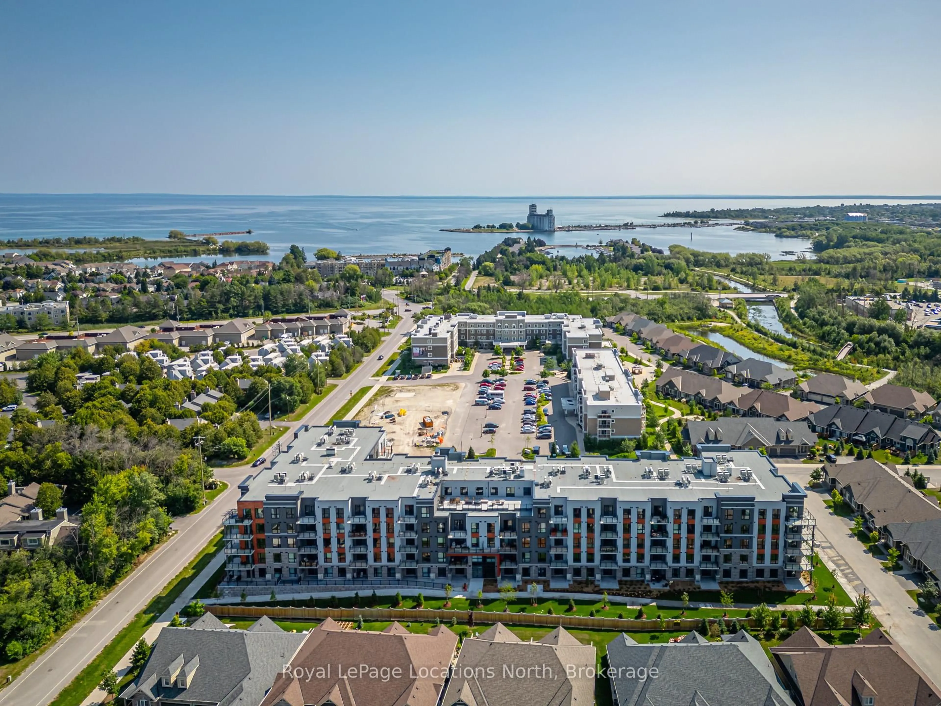 A pic from outside/outdoor area/front of a property/back of a property/a pic from drone, water/lake/river/ocean view for 4 Kimberly Lane #309, Collingwood Ontario L9Y 5B4