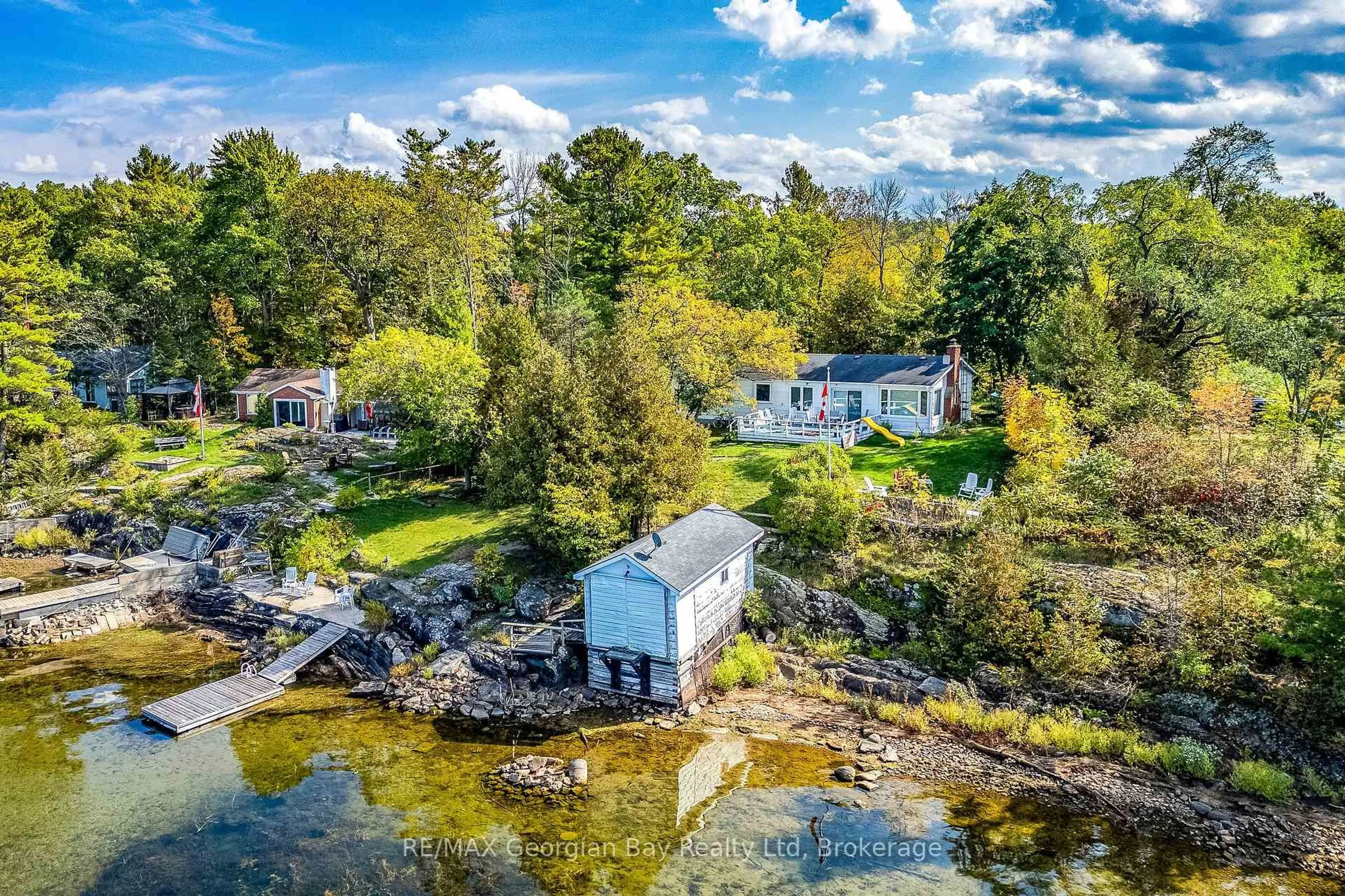 A pic from outside/outdoor area/front of a property/back of a property/a pic from drone, water/lake/river/ocean view for 134 Forest Harbour Pkwy, Tay Ontario L0K 2C0