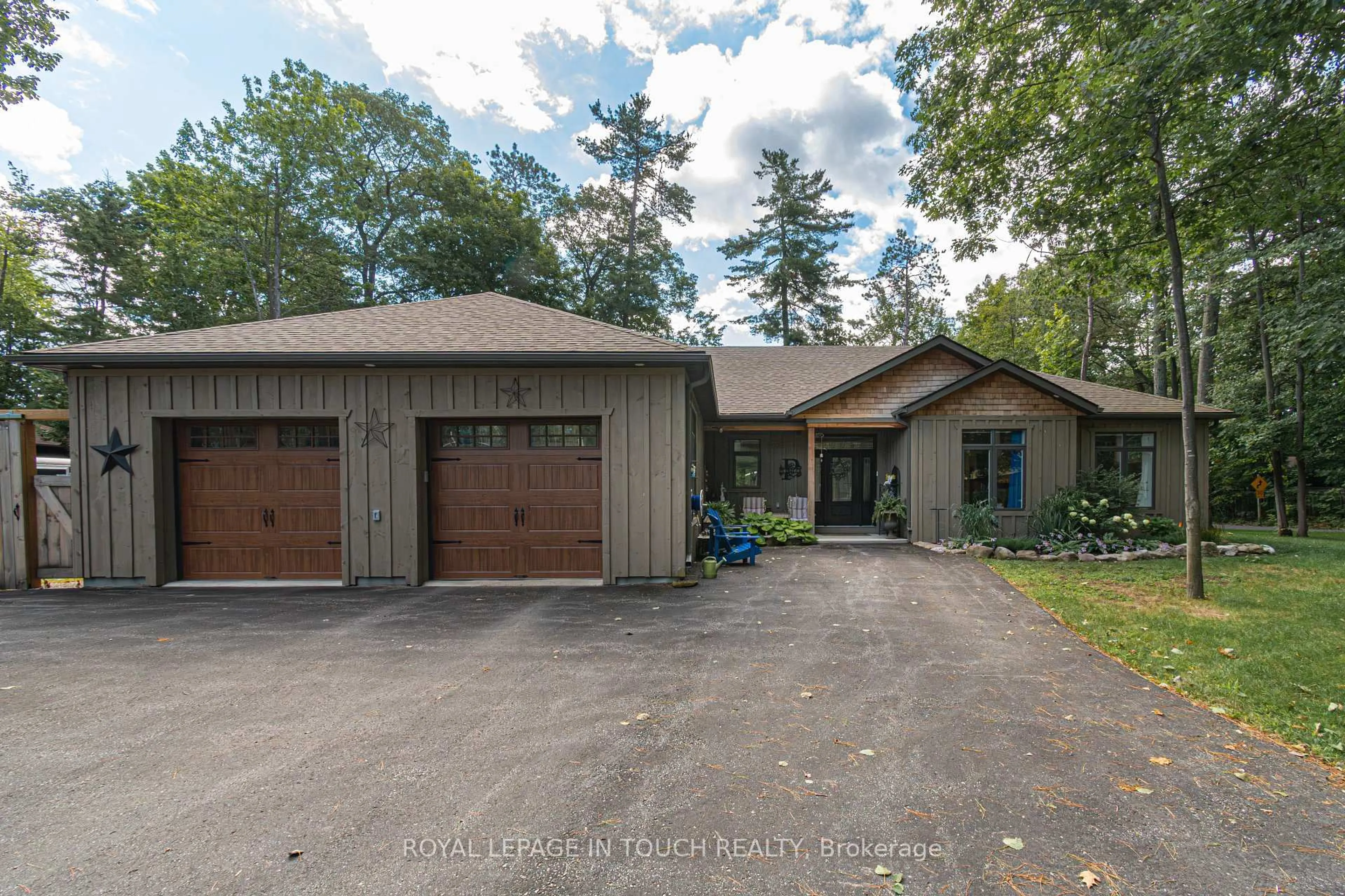 Home with brick exterior material, street for 1 Spruce St, Tiny Ontario L0L 1P0