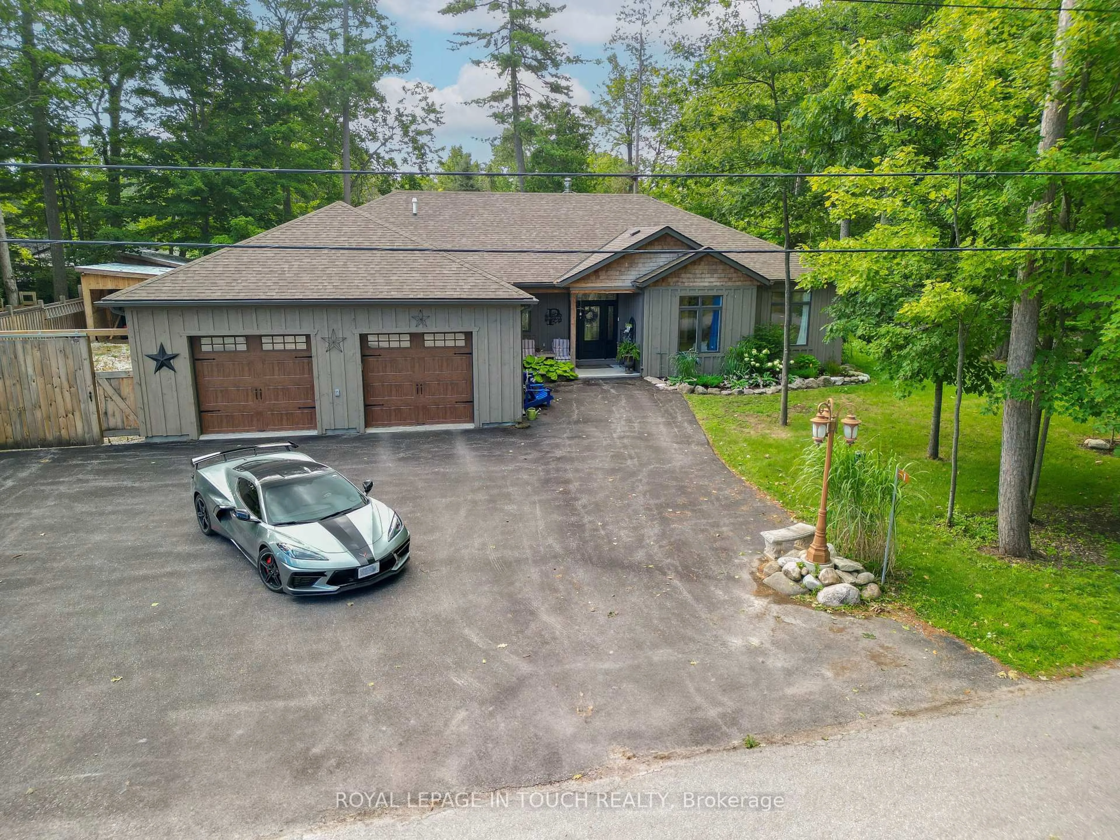 A pic from outside/outdoor area/front of a property/back of a property/a pic from drone, unknown for 1 Spruce St, Tiny Ontario L0L 1P0