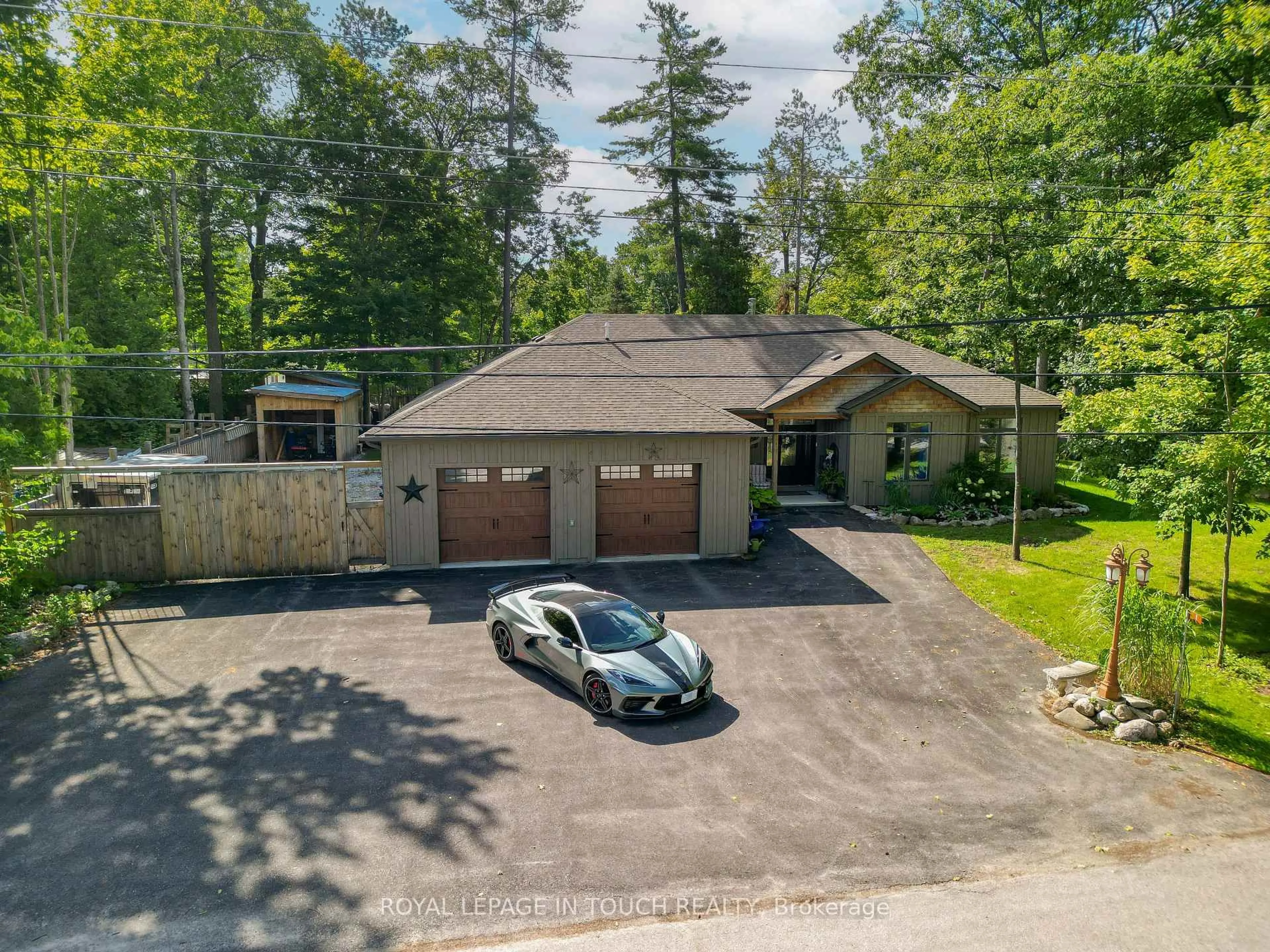 A pic from outside/outdoor area/front of a property/back of a property/a pic from drone, street for 1 Spruce St, Tiny Ontario L0L 1P0