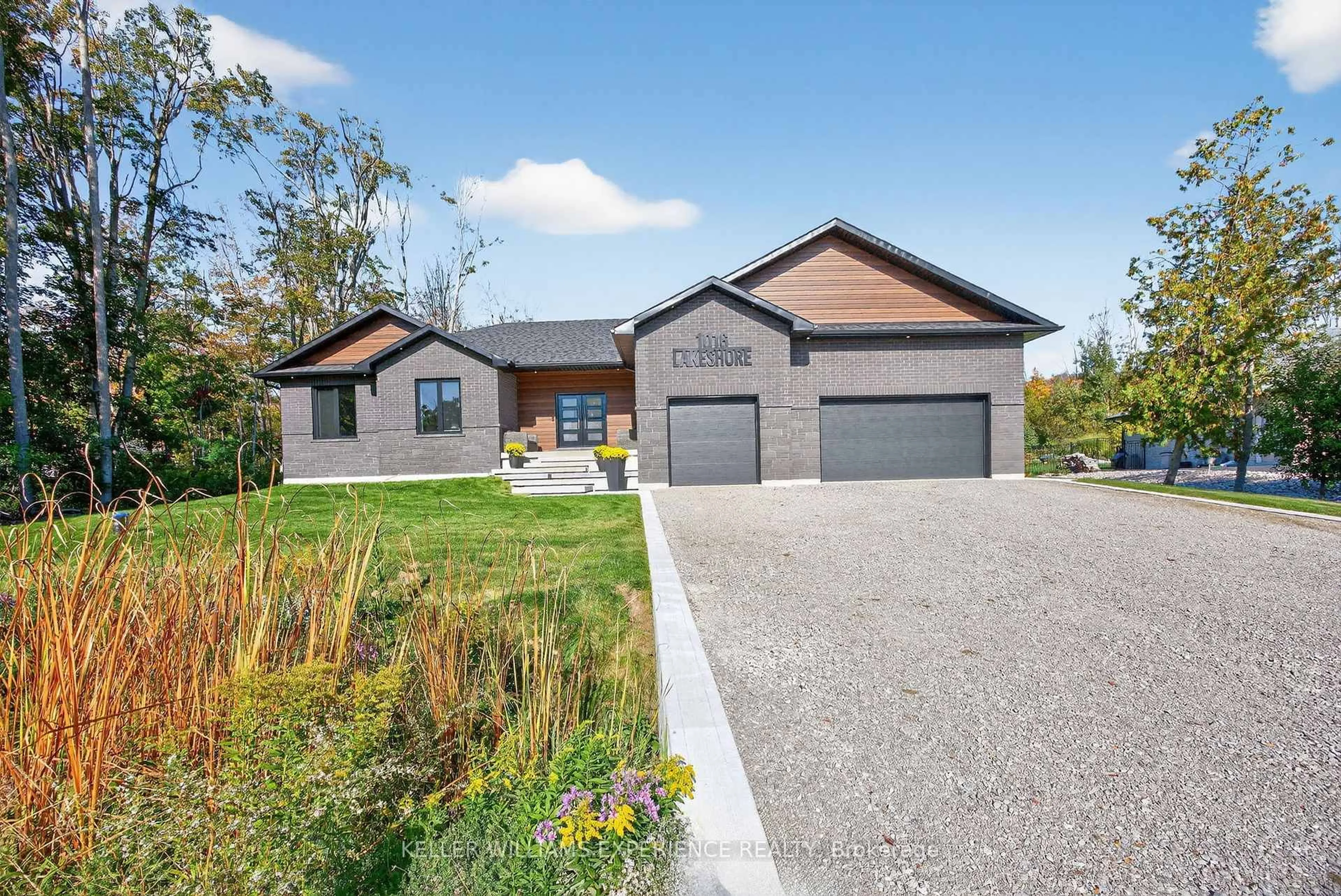 Home with brick exterior material, street for 1016 Lakeshore Rd, Oro-Medonte Ontario L0L 1T0