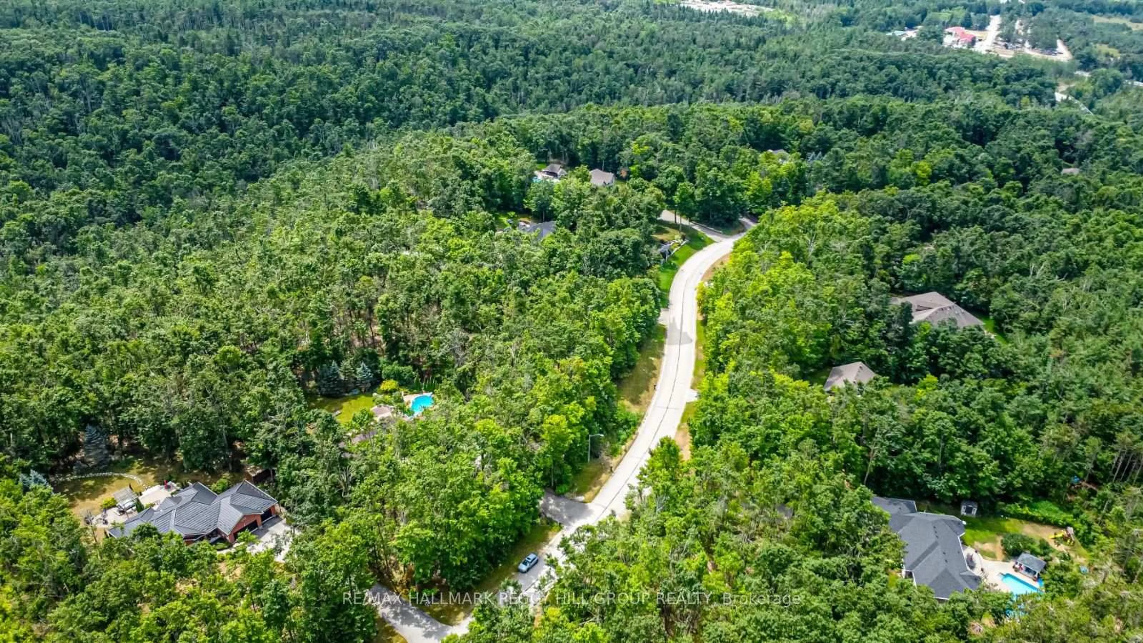 A pic from outside/outdoor area/front of a property/back of a property/a pic from drone, forest/trees view for 17 Maple Ridge Rd, Oro-Medonte Ontario L0L 2L0