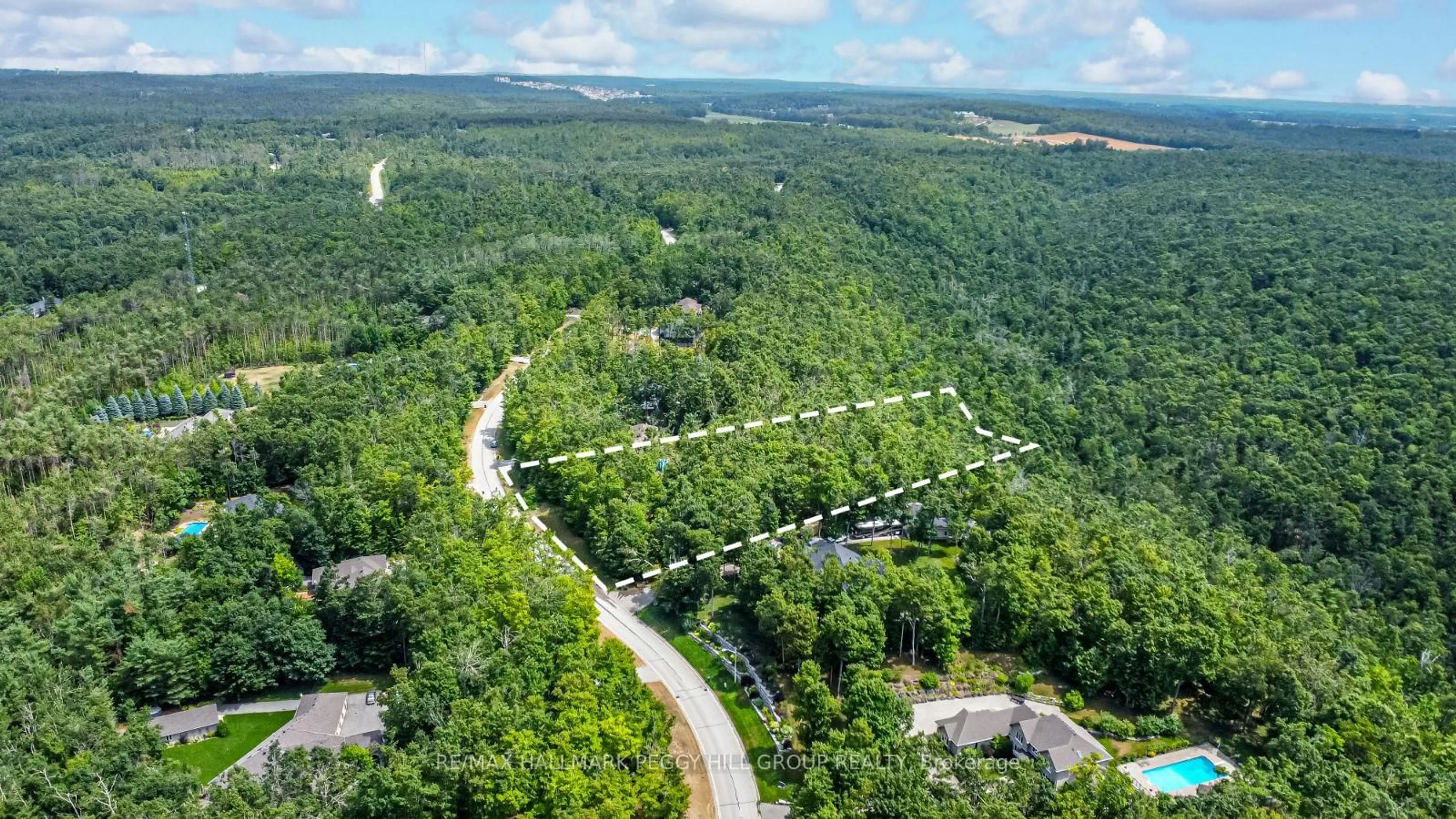 A pic from outside/outdoor area/front of a property/back of a property/a pic from drone, forest/trees view for 17 Maple Ridge Rd, Oro-Medonte Ontario L0L 2L0