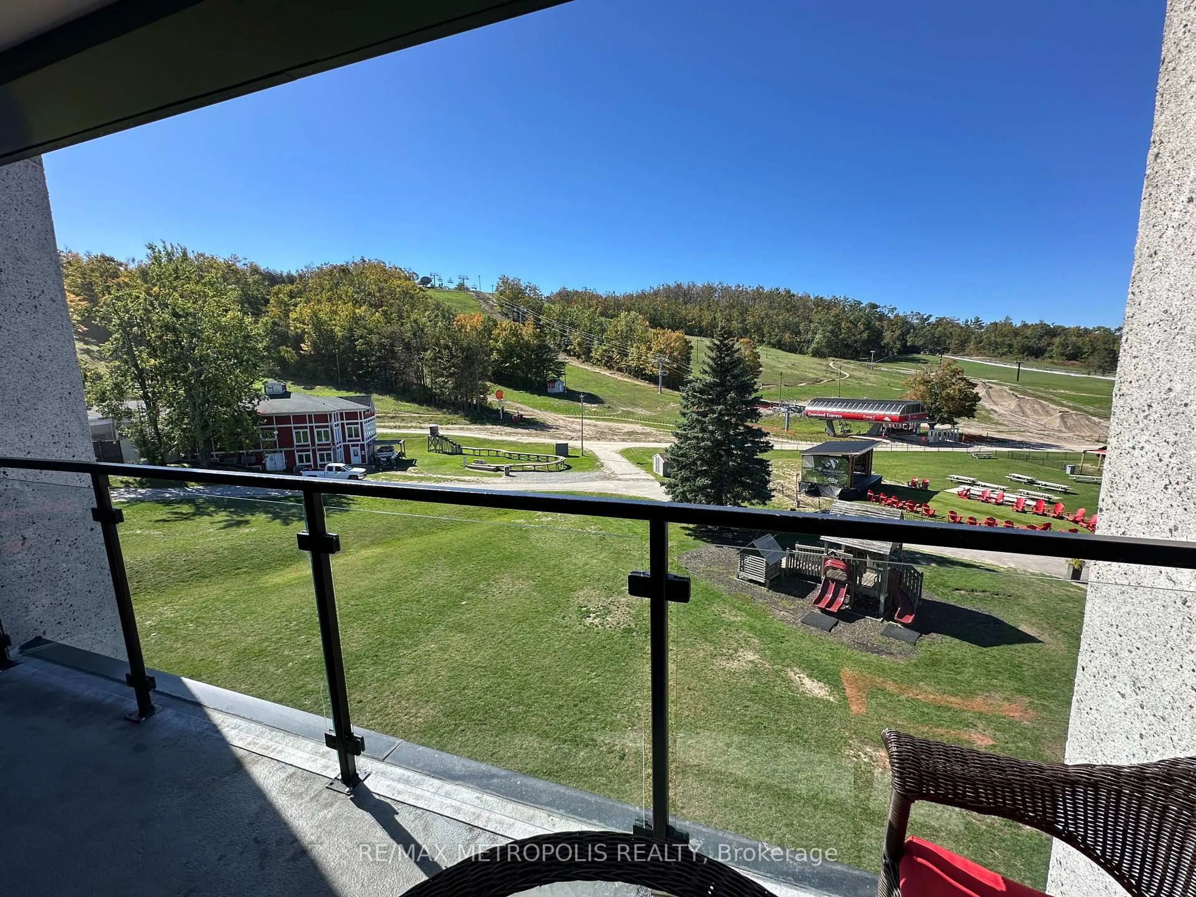A pic from outside/outdoor area/front of a property/back of a property/a pic from drone, water/lake/river/ocean view for 80 Horseshoe Blvd #301, Oro-Medonte Ontario L4M 4Y8