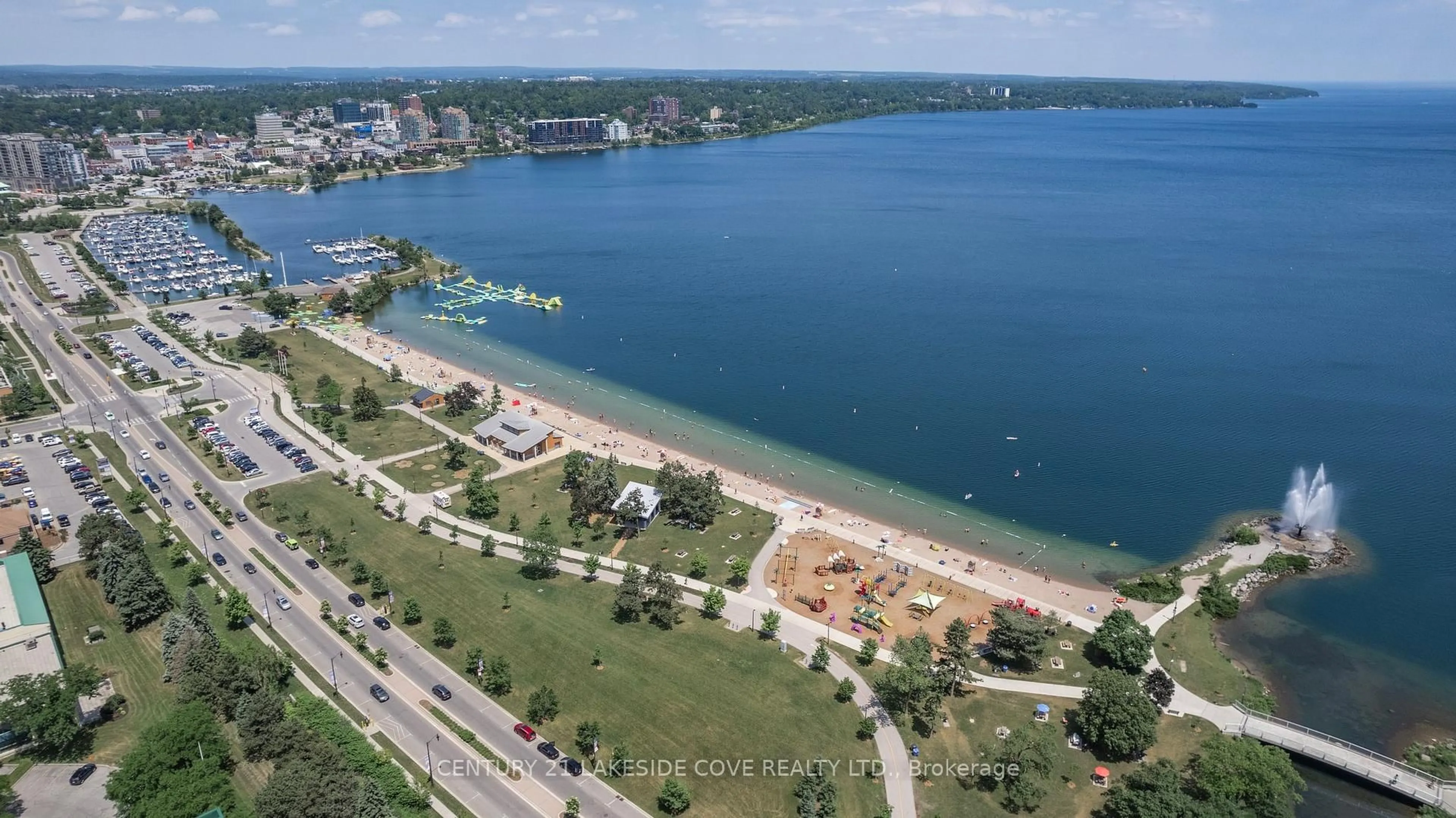 A pic from outside/outdoor area/front of a property/back of a property/a pic from drone, water/lake/river/ocean view for 75 Ellen St #711, Barrie Ontario L4N 7R6