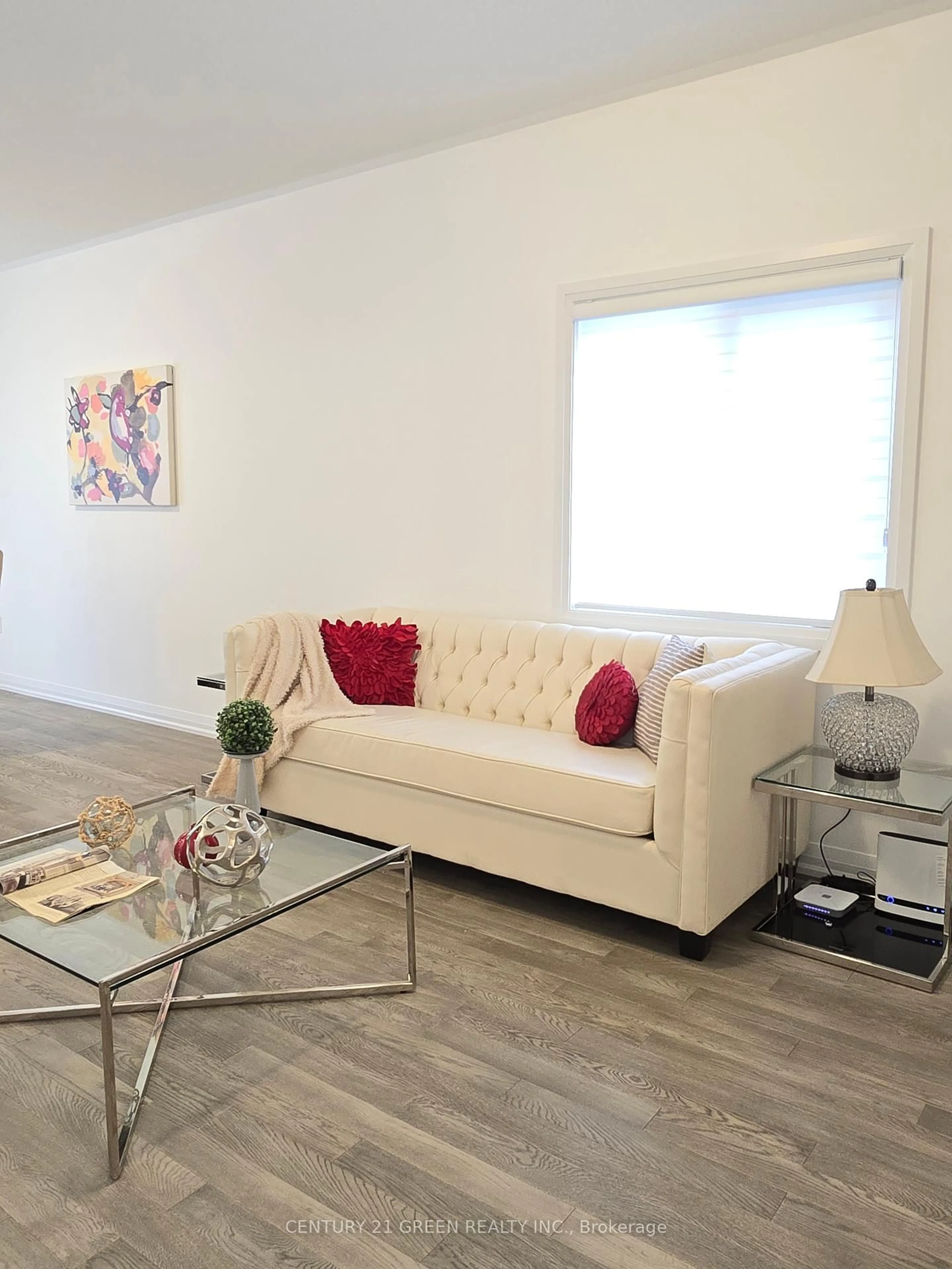 Living room with furniture, wood/laminate floor for 49 Koda St, Barrie Ontario L9J 0H7