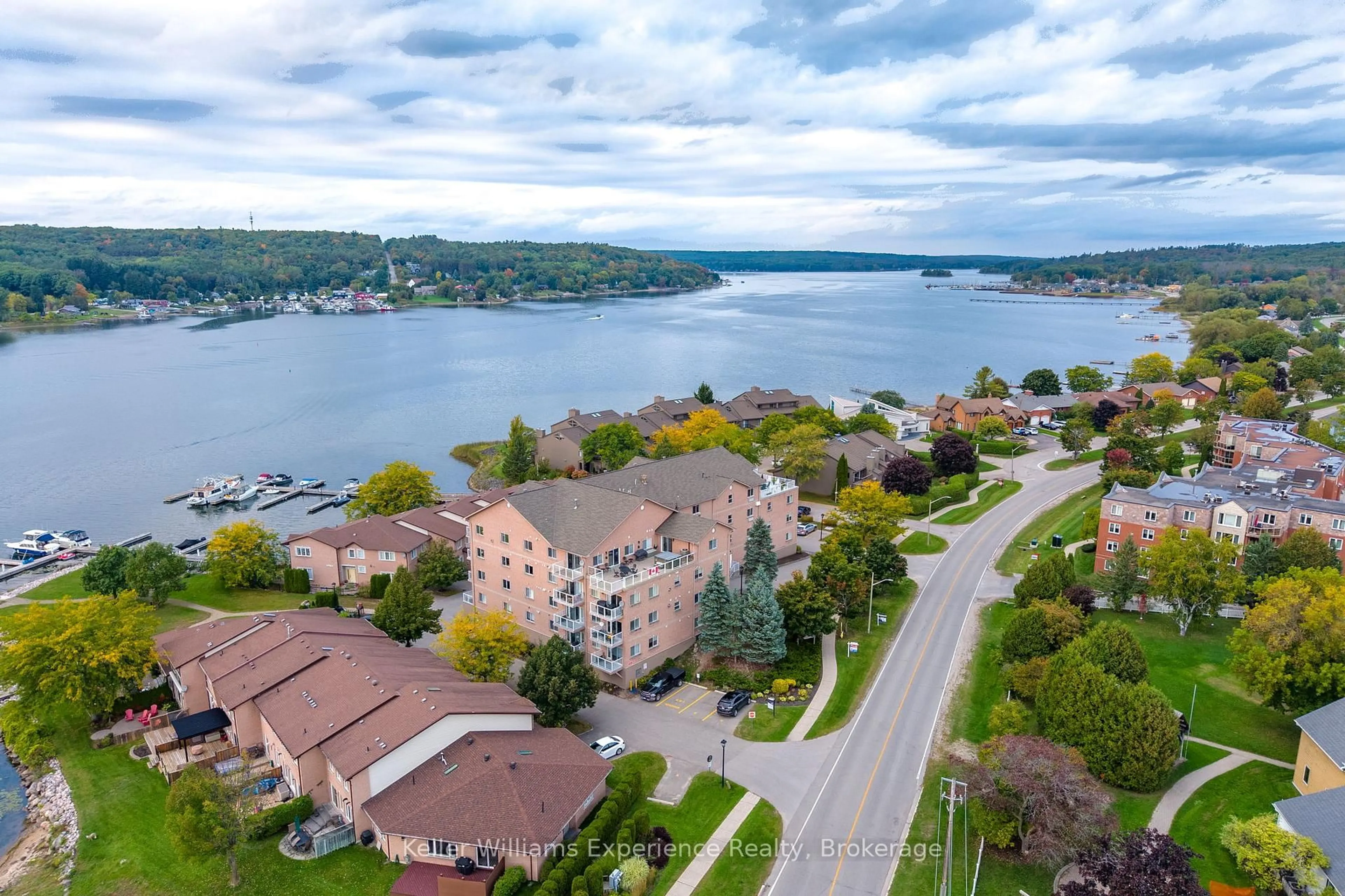 A pic from outside/outdoor area/front of a property/back of a property/a pic from drone, water/lake/river/ocean view for 4 Beck Blvd #301, Penetanguishene Ontario L9M 2H3