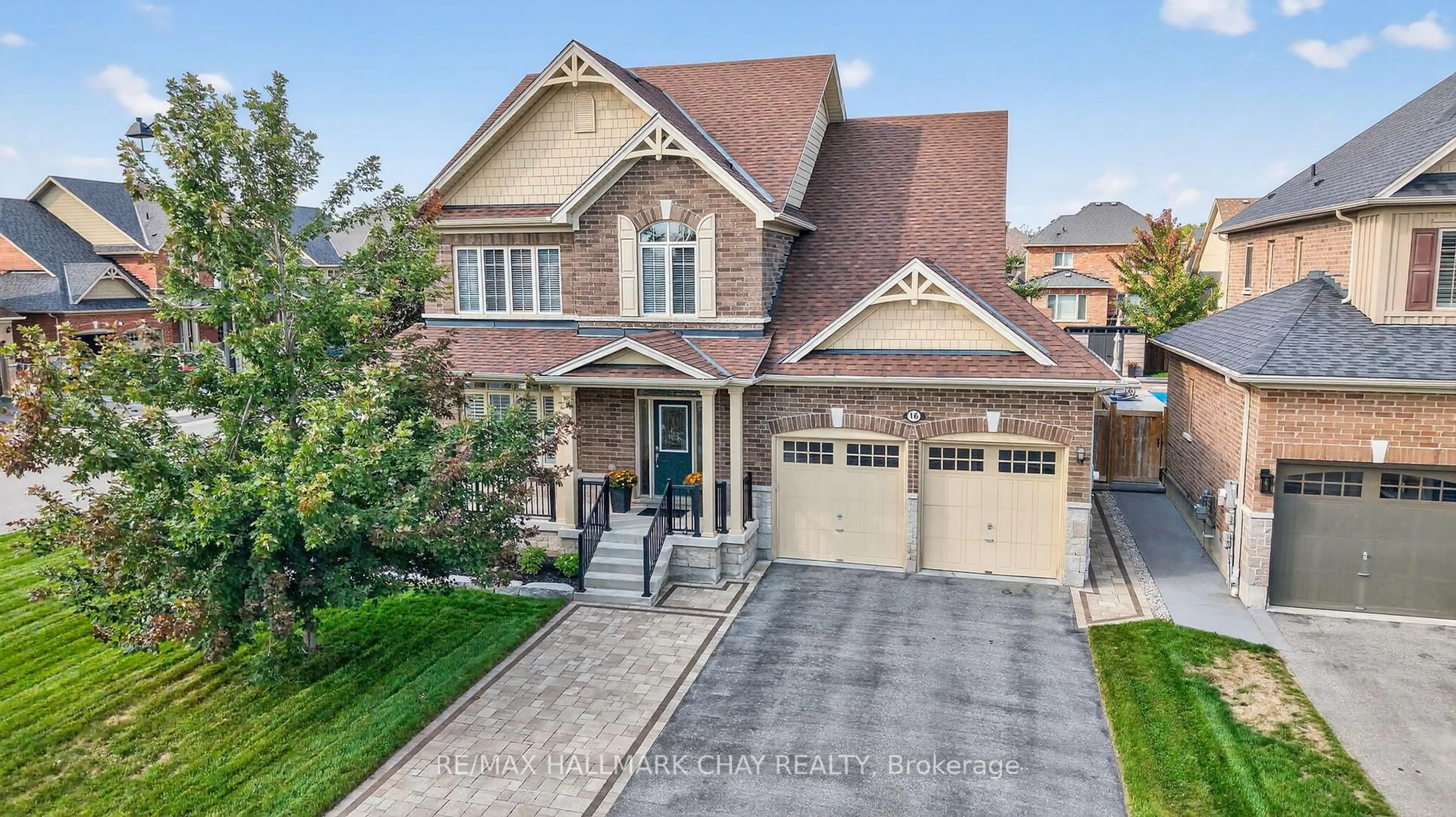 Home with brick exterior material, street for 16 Walker Lane, Springwater Ontario L9X 0S9