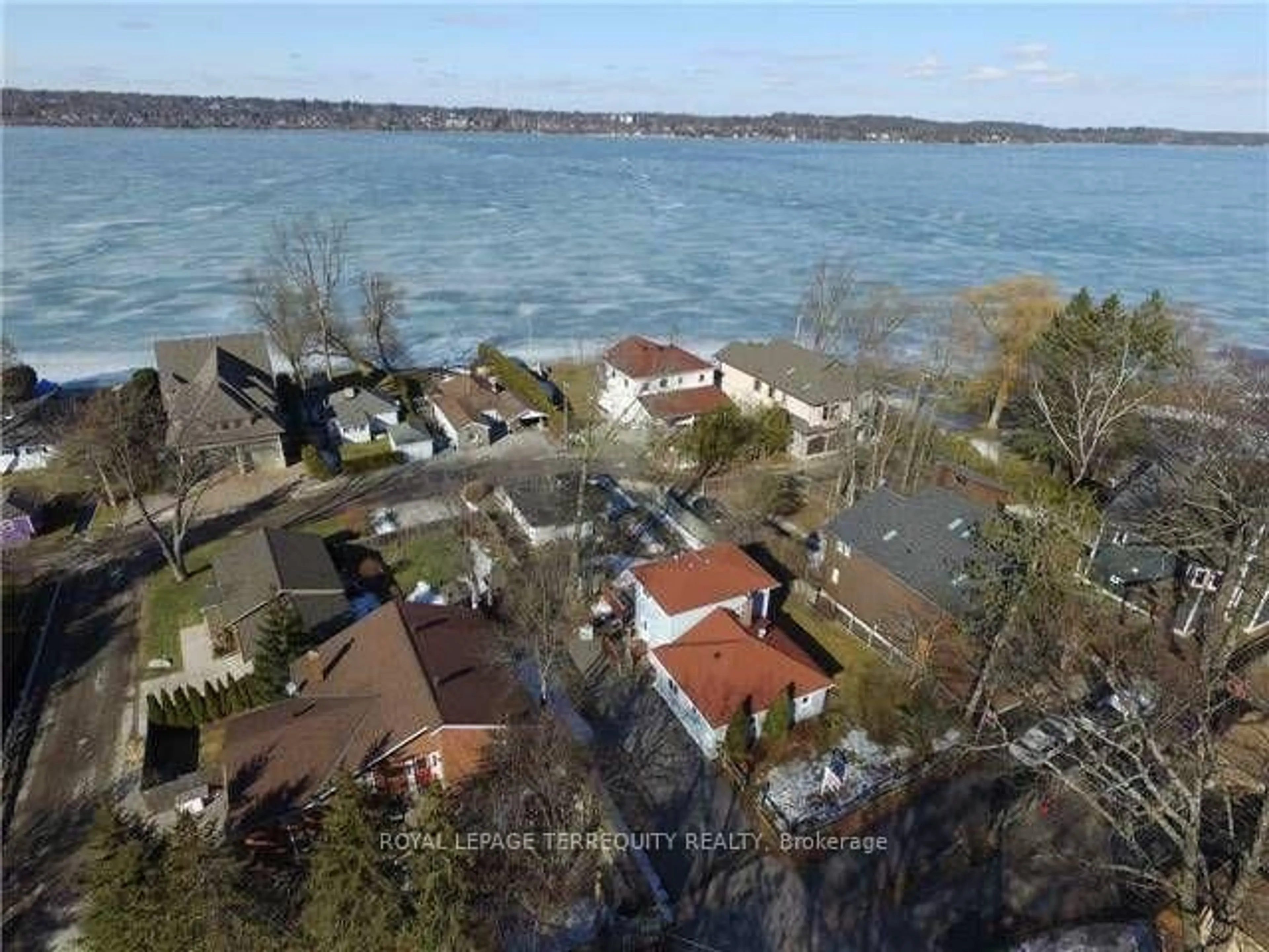 A pic from outside/outdoor area/front of a property/back of a property/a pic from drone, water/lake/river/ocean view for 40 Brennan Ave, Barrie Ontario L4N 3X3