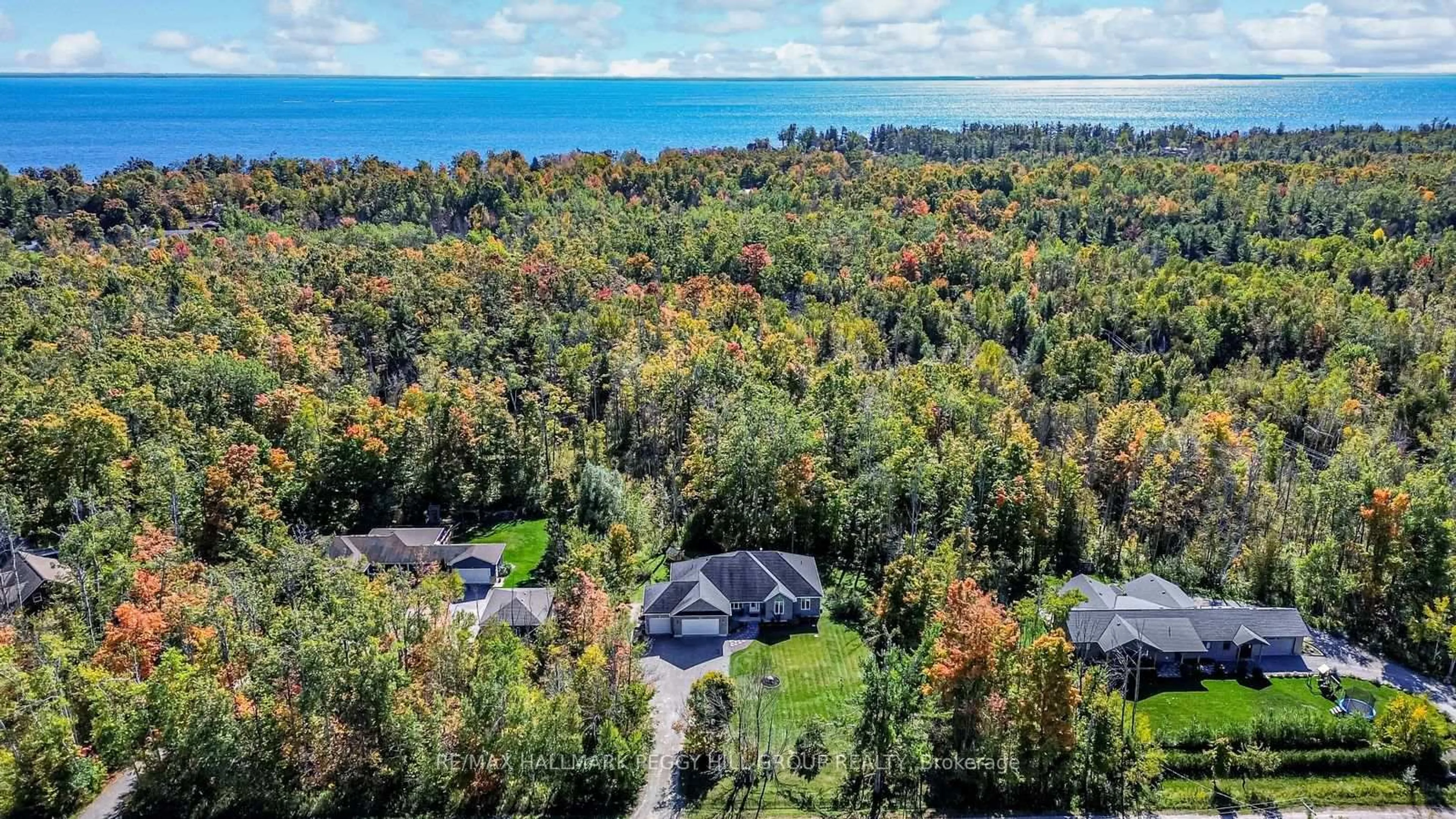 A pic from outside/outdoor area/front of a property/back of a property/a pic from drone, water/lake/river/ocean view for 33 Springhome Rd, Oro-Medonte Ontario L0L 1T0