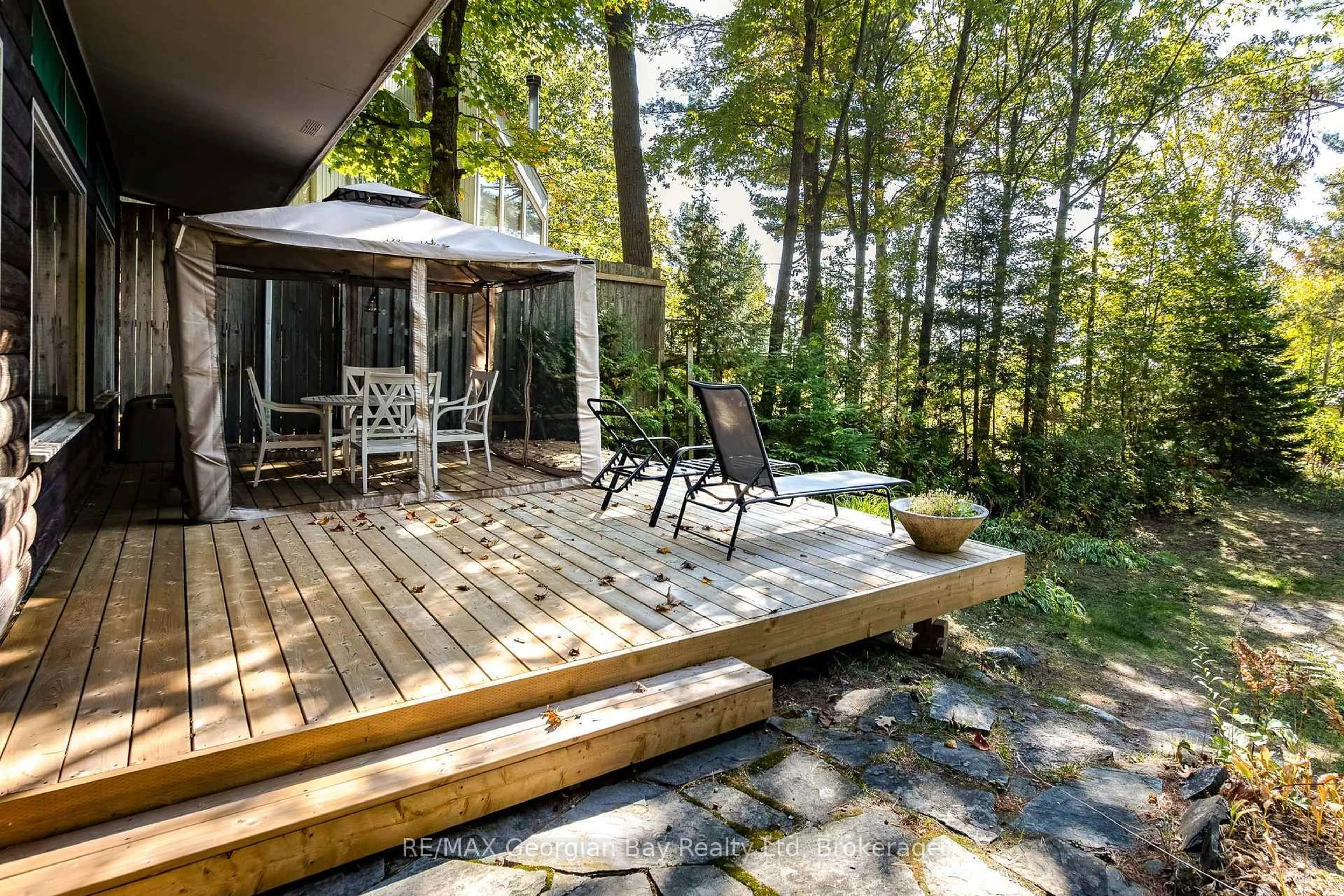 Patio, forest/trees view for 100 Nottawaga Dr, Tiny Ontario L0L 2J0