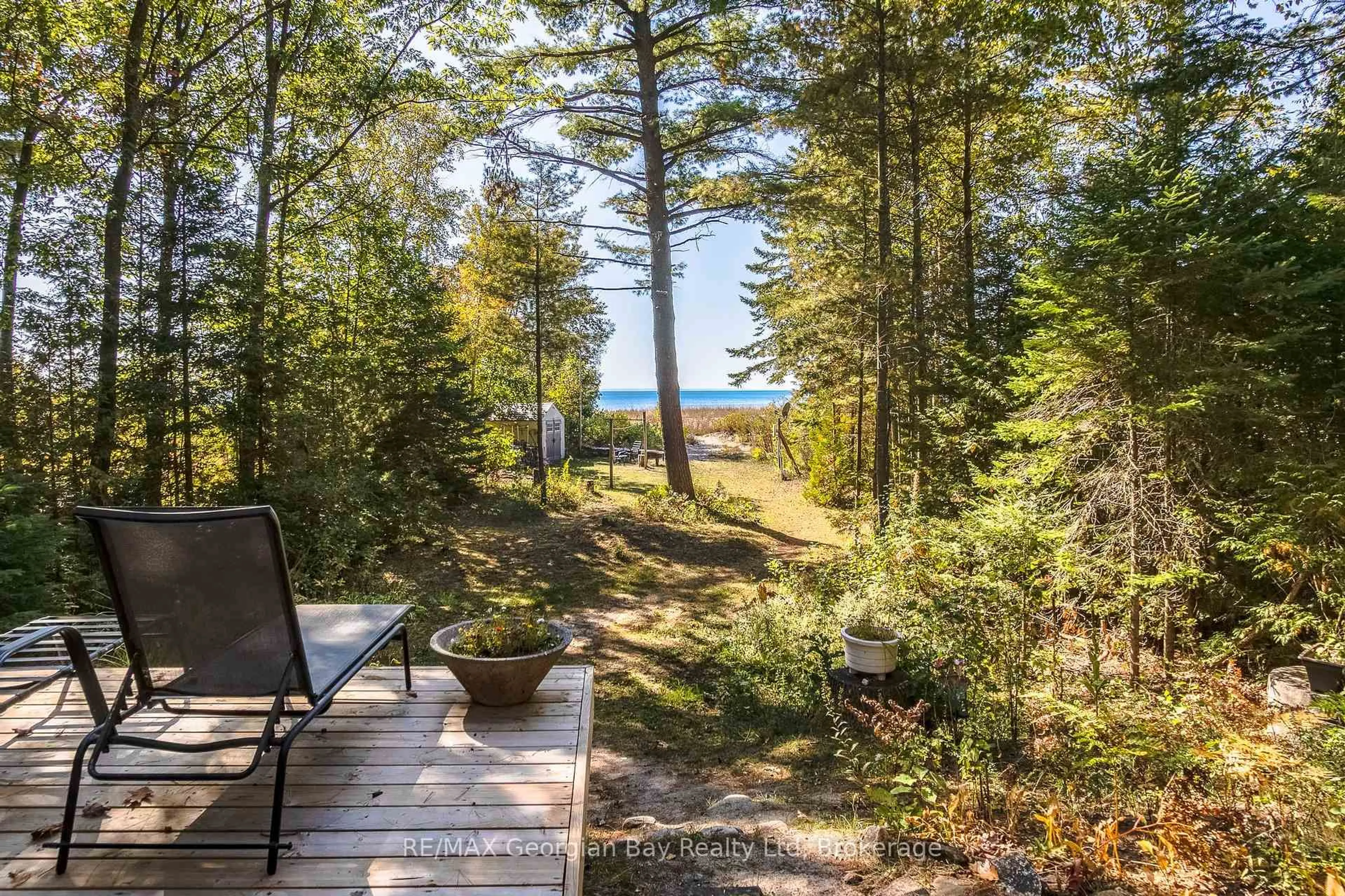 Patio, forest/trees view for 100 Nottawaga Dr, Tiny Ontario L0L 2J0