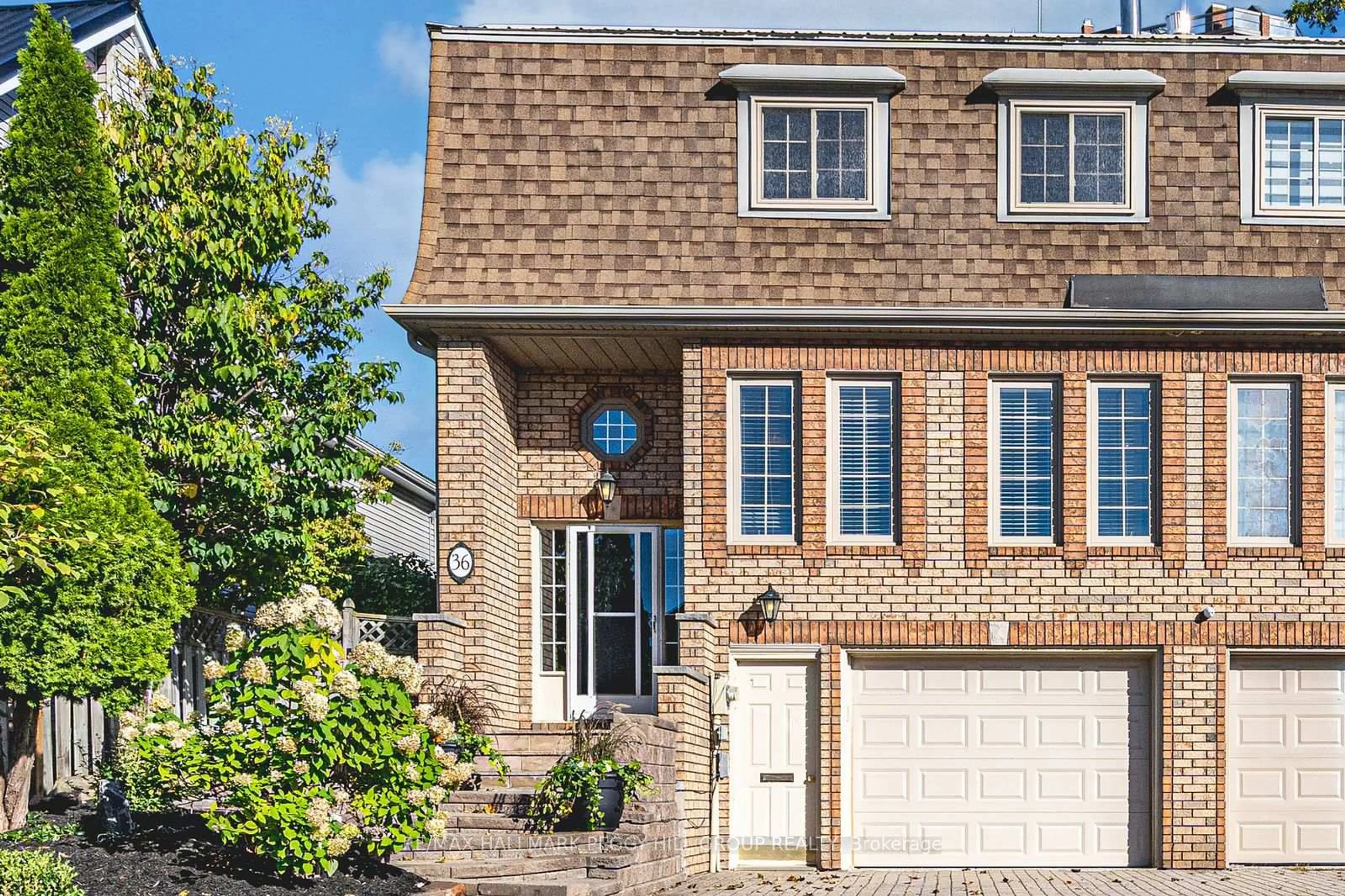 Home with brick exterior material, street for 36 Kempenfelt Dr, Barrie Ontario L4M 1B9