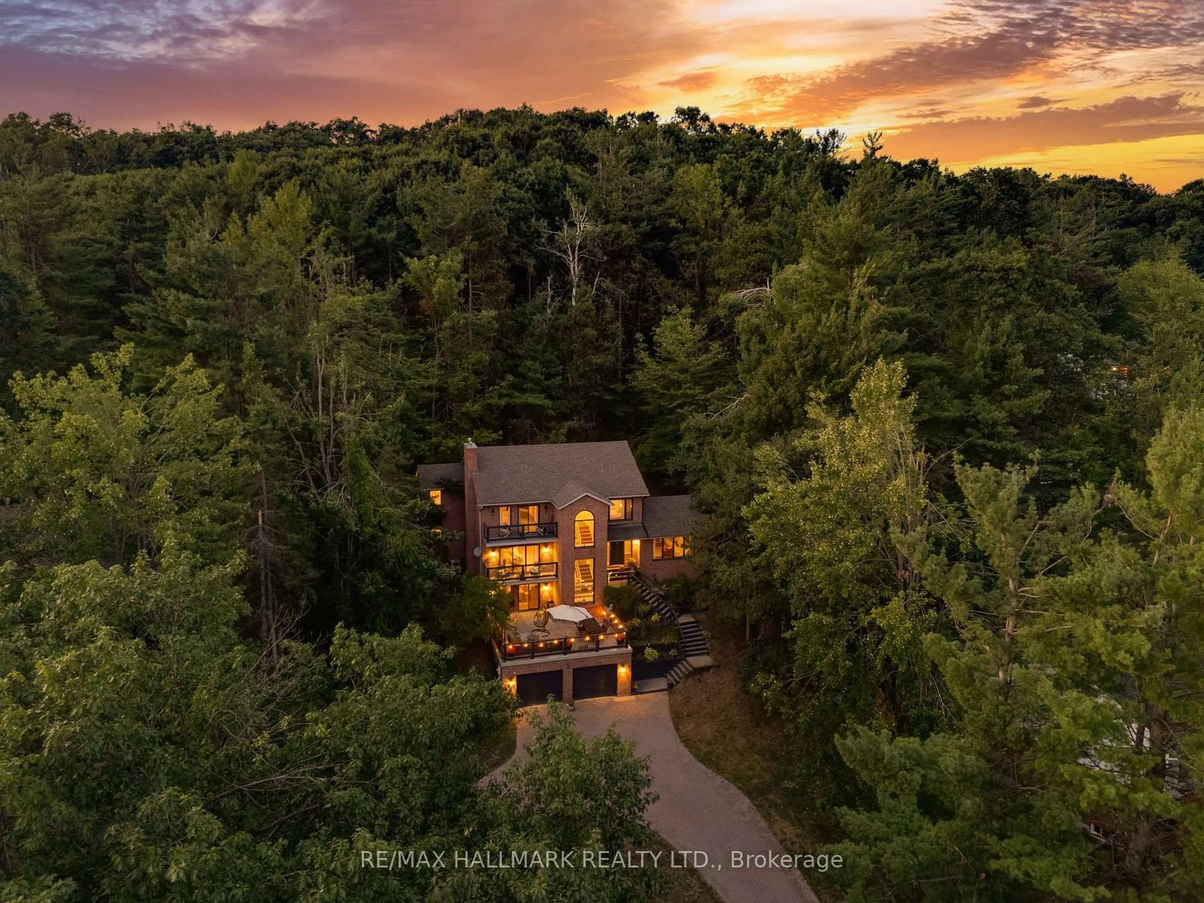 A pic from outside/outdoor area/front of a property/back of a property/a pic from drone, forest/trees view for 30 Pooles Rd, Springwater Ontario L0L 1X1