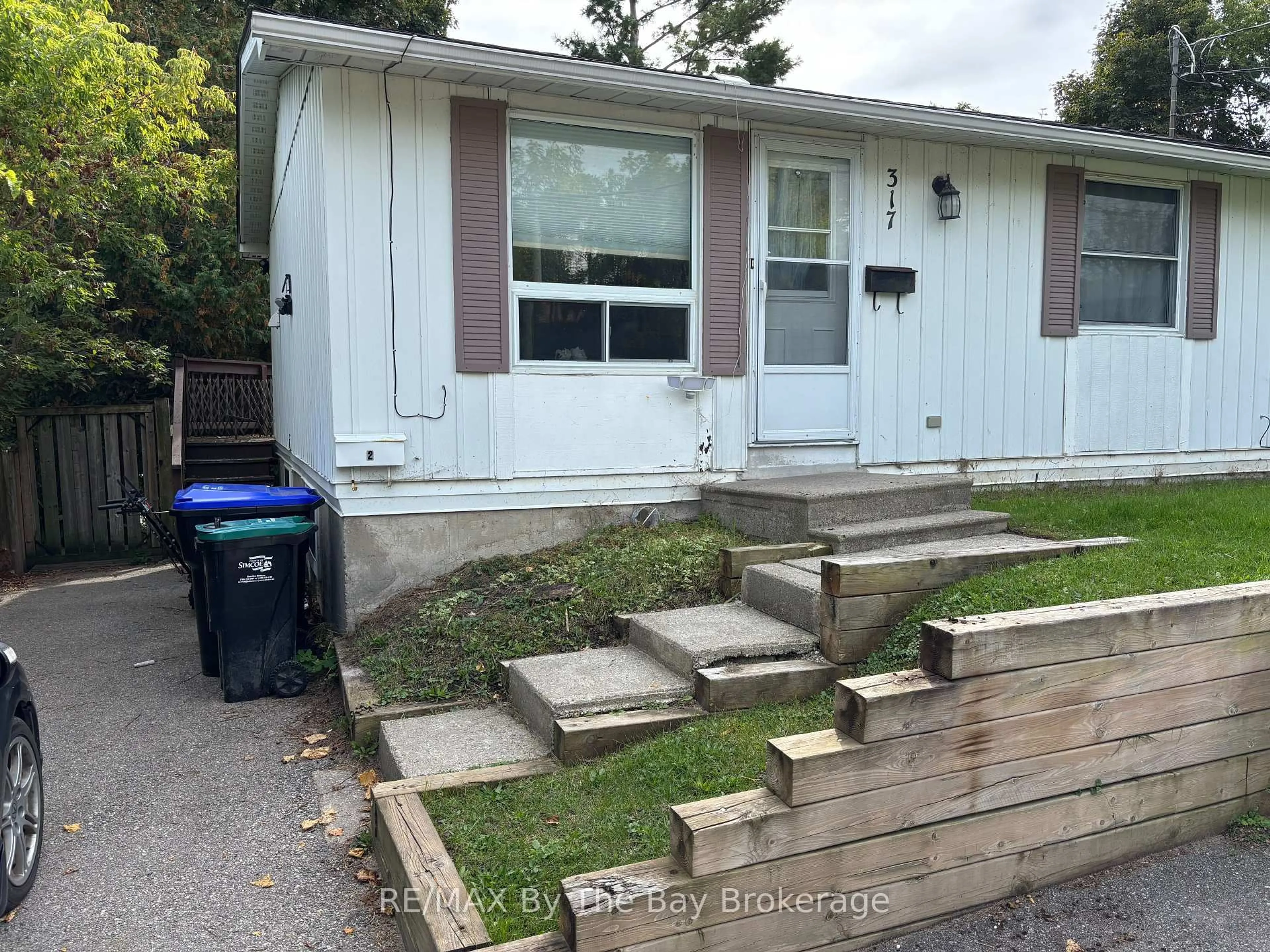 Home with vinyl exterior material, street for 317 Hugel Ave, Midland Ontario L4R 1T5