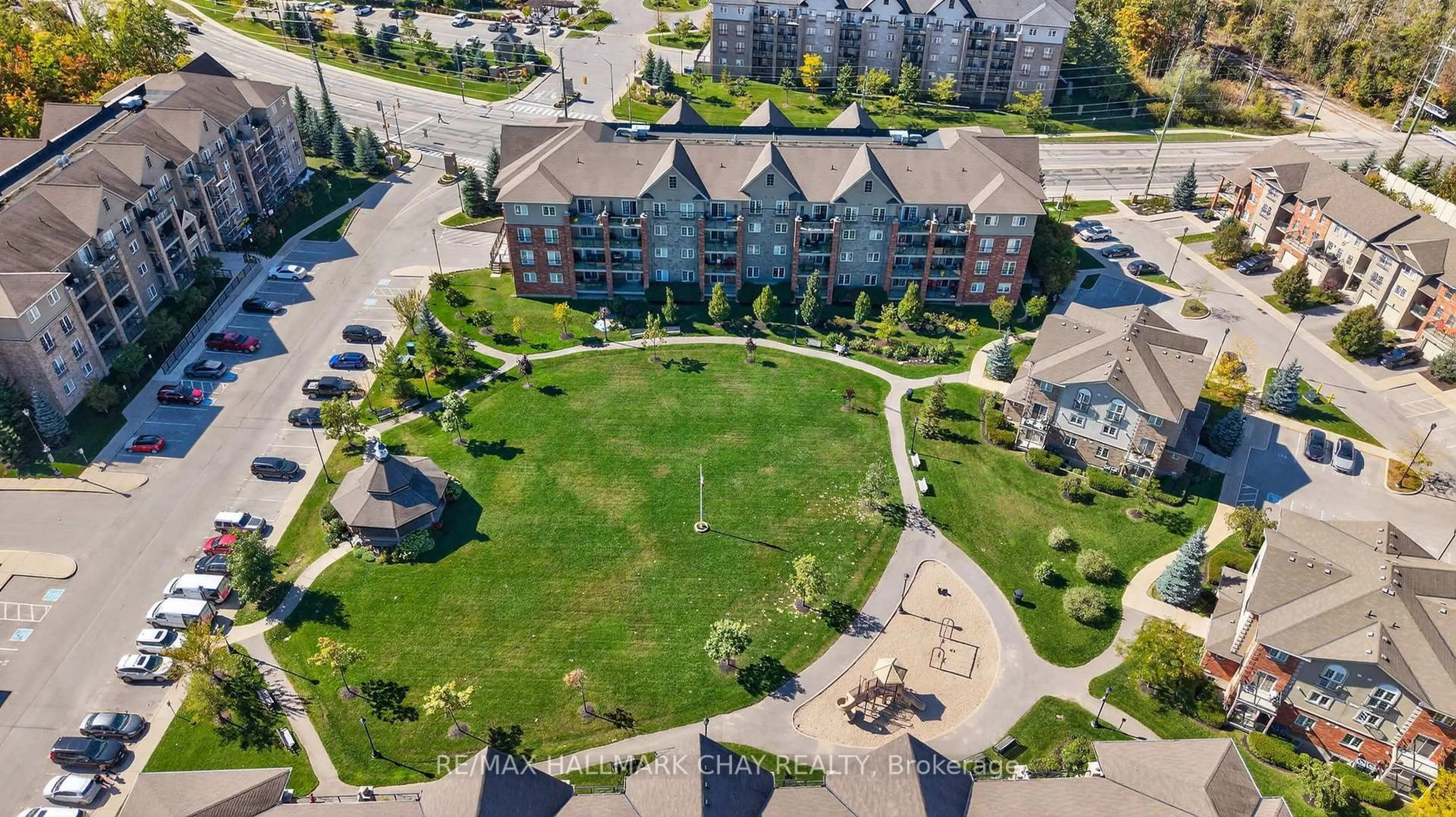 A pic from outside/outdoor area/front of a property/back of a property/a pic from drone, unknown for 39 Ferndale Dr #405, Barrie Ontario L4N 5T5