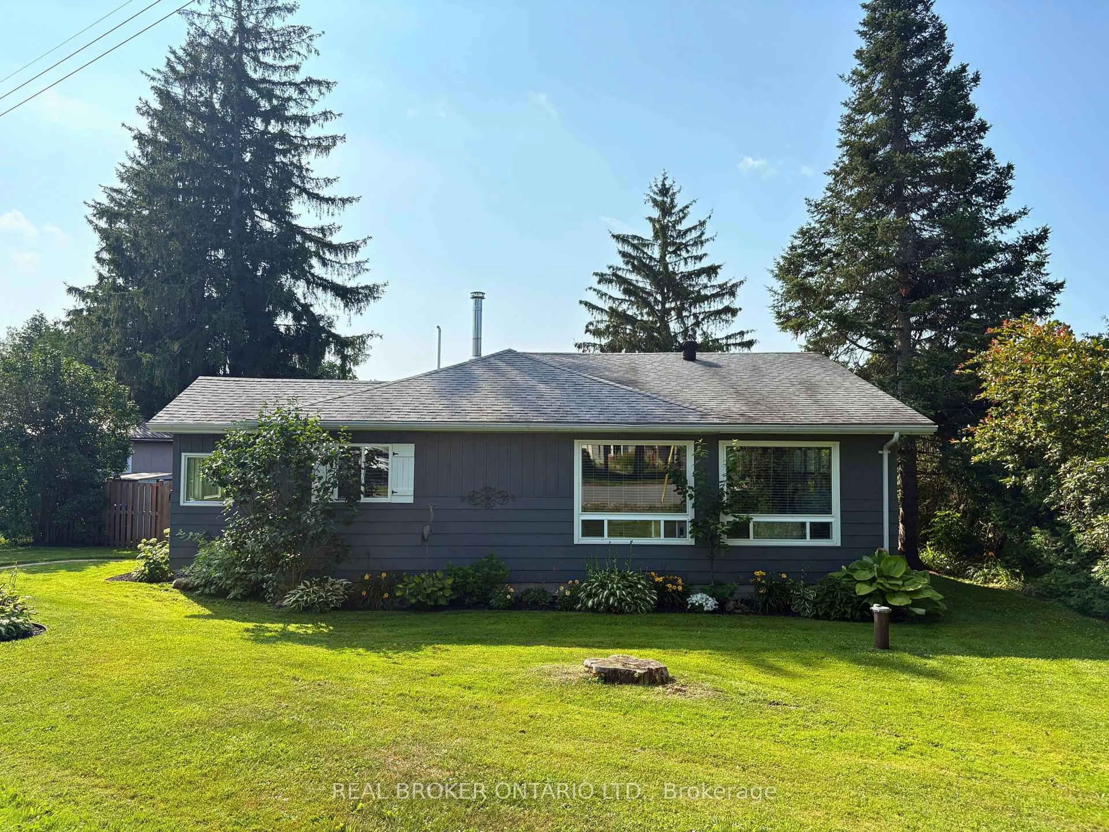 A pic from outside/outdoor area/front of a property/back of a property/a pic from drone, unknown for 23 Owen Rd, Oro-Medonte Ontario L0L 1T0