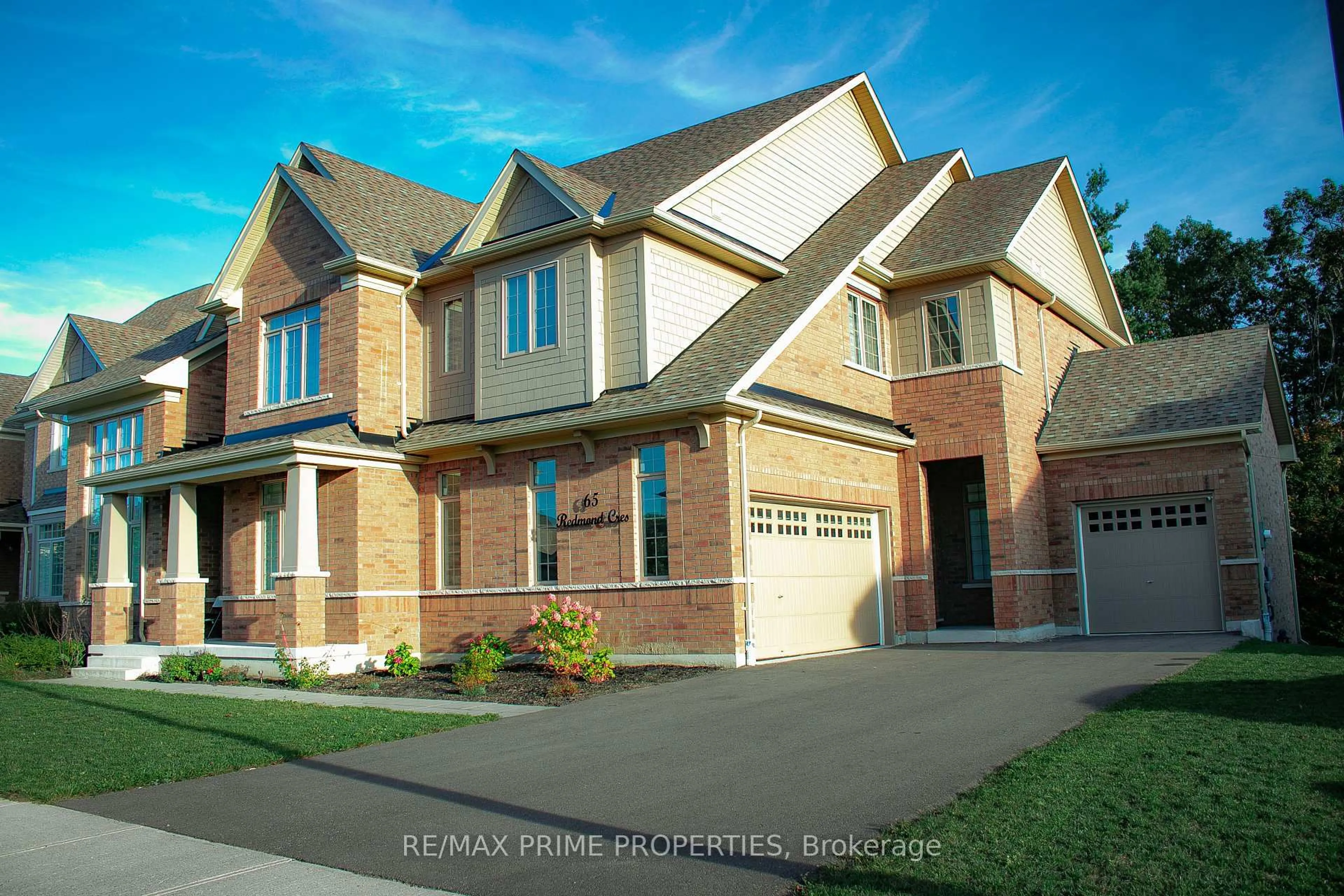 Home with brick exterior material, street for 65 Redmond Cres, Springwater Ontario L9X 1Z8