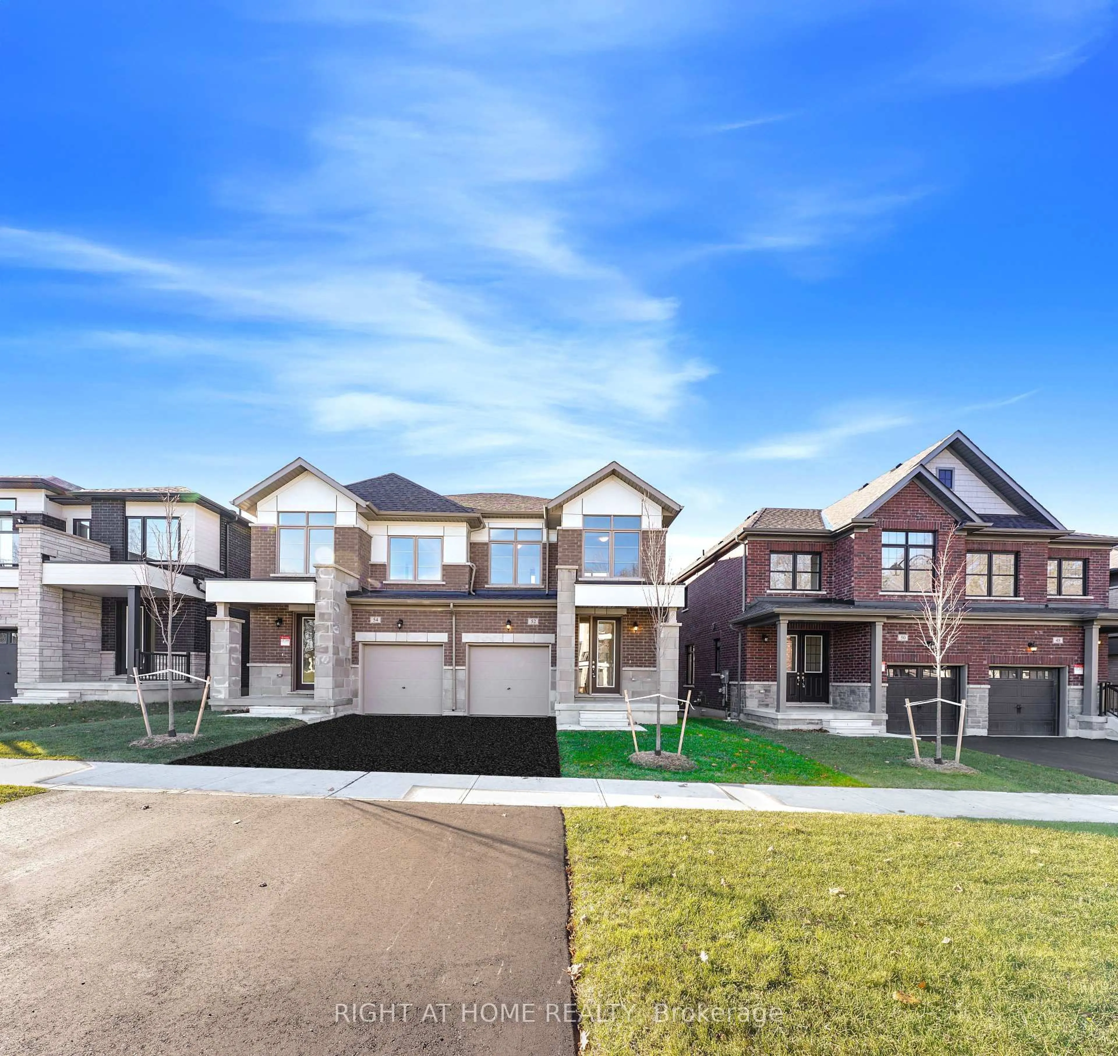 Home with brick exterior material, street for 52 Bearberry Rd, Springwater Ontario L9X 2E2