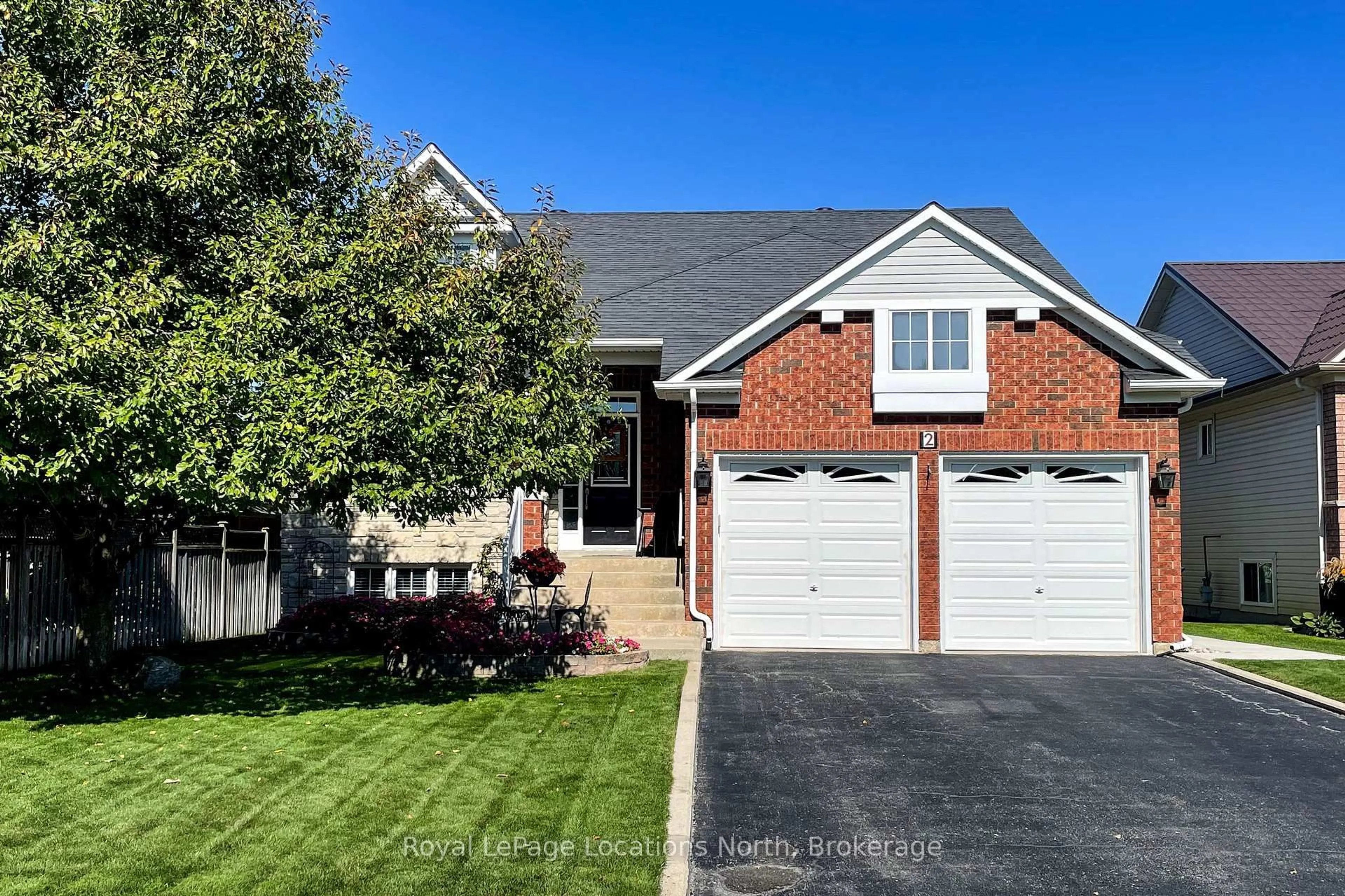 Home with brick exterior material, street for 2 Wintergreen Way, Wasaga Beach Ontario L9Z 3A9