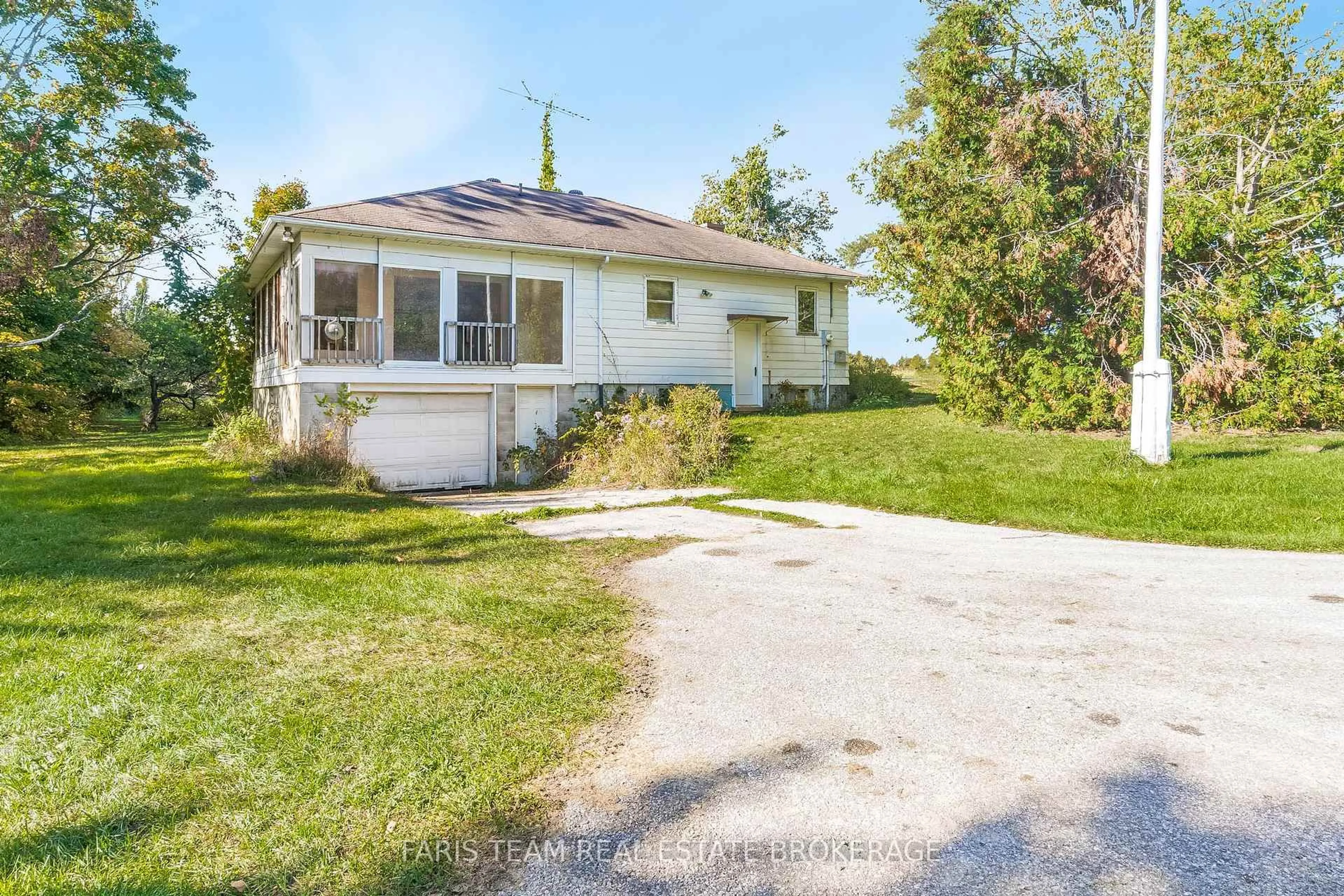 A pic from outside/outdoor area/front of a property/back of a property/a pic from drone, street for 201 Ridge Rd, Oro-Medonte Ontario L0L 2E0