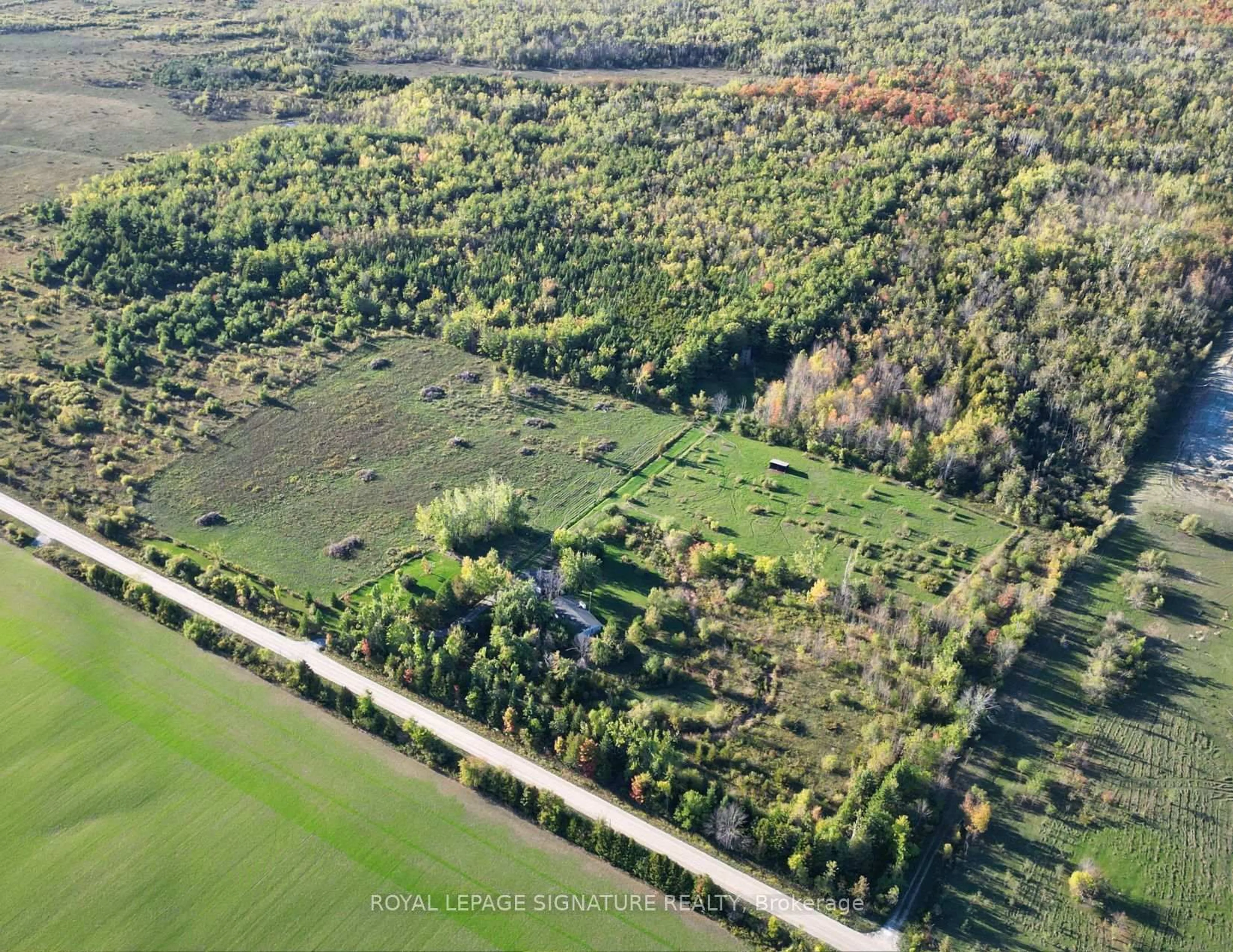 A pic from outside/outdoor area/front of a property/back of a property/a pic from drone, forest/trees view for 1152 Concession Rd, Ramara Ontario L0K 1B0