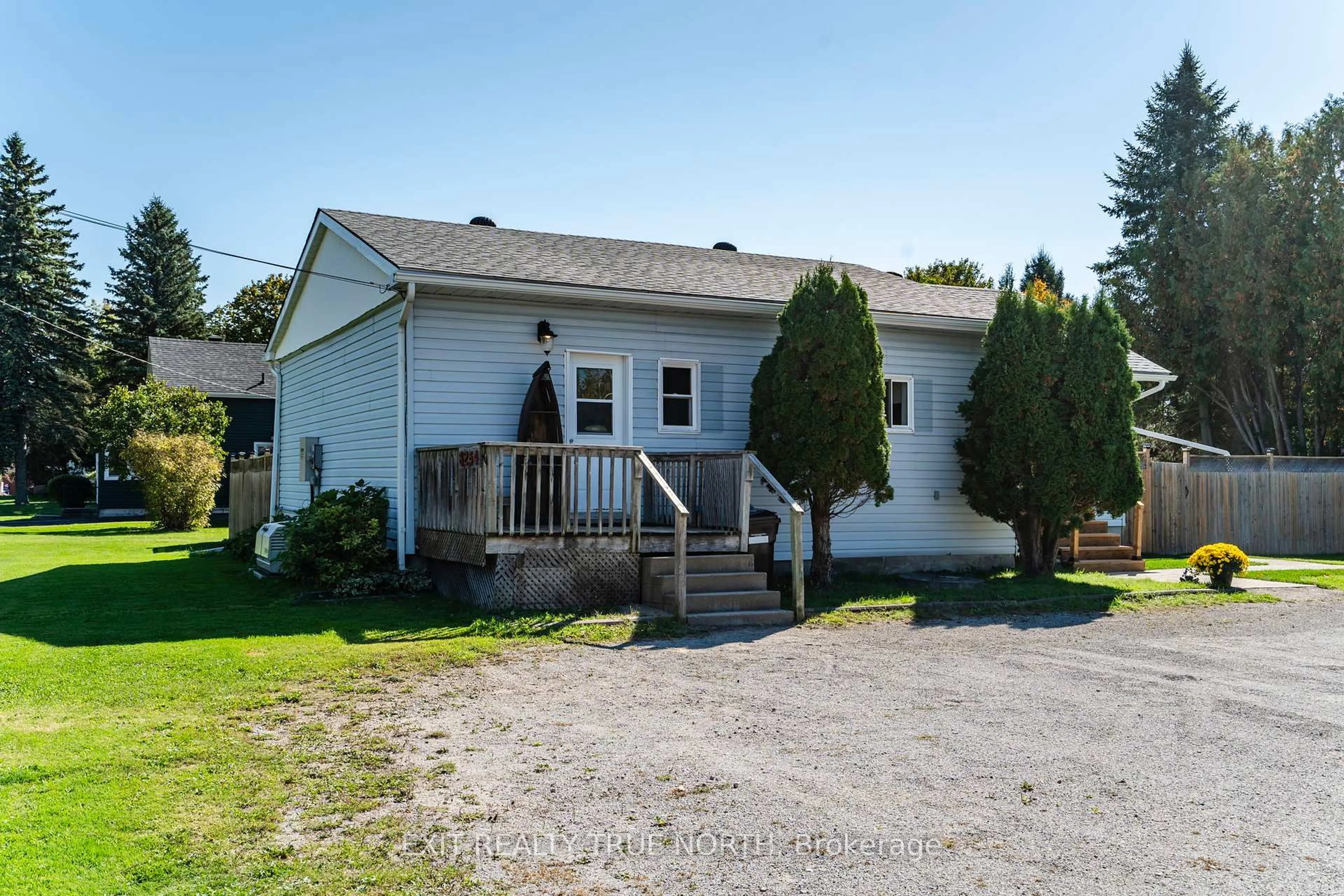 A pic from outside/outdoor area/front of a property/back of a property/a pic from drone, street for 8254 93 Highway, Tiny Ontario L0K 2E0