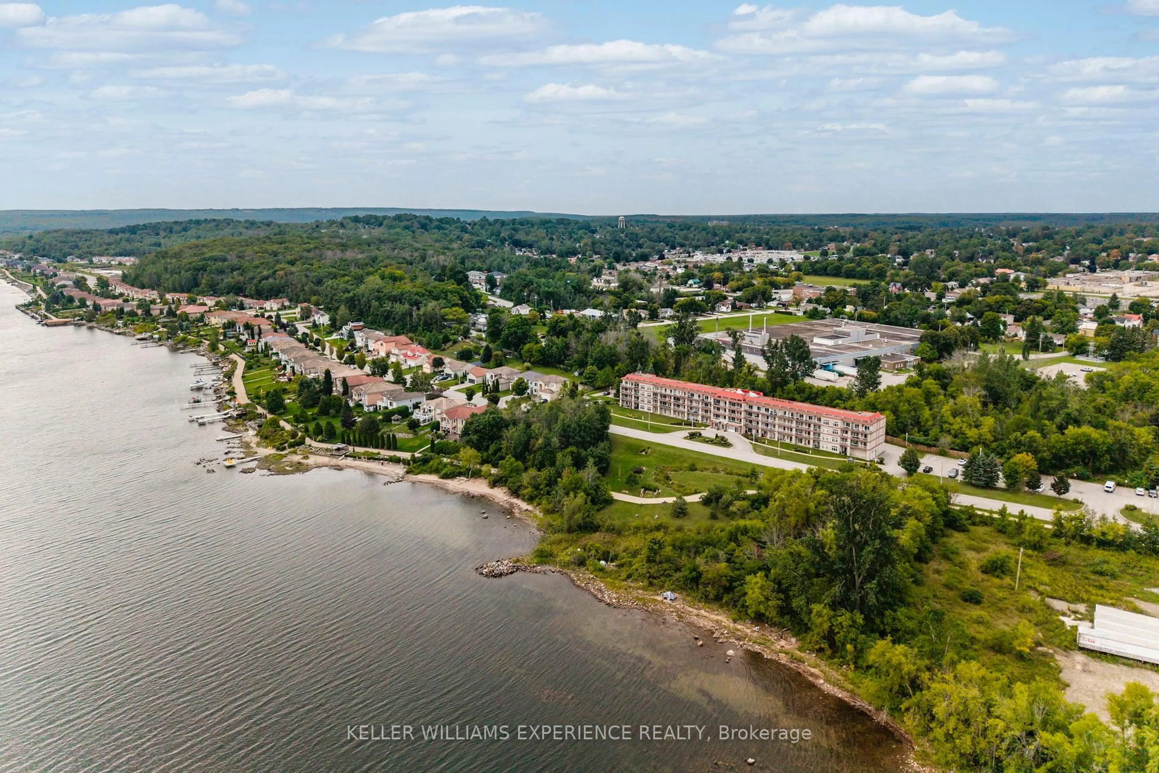 A pic from outside/outdoor area/front of a property/back of a property/a pic from drone, water/lake/river/ocean view for 280 Aberdeen Blvd #111, Midland Ontario L4R 5N4