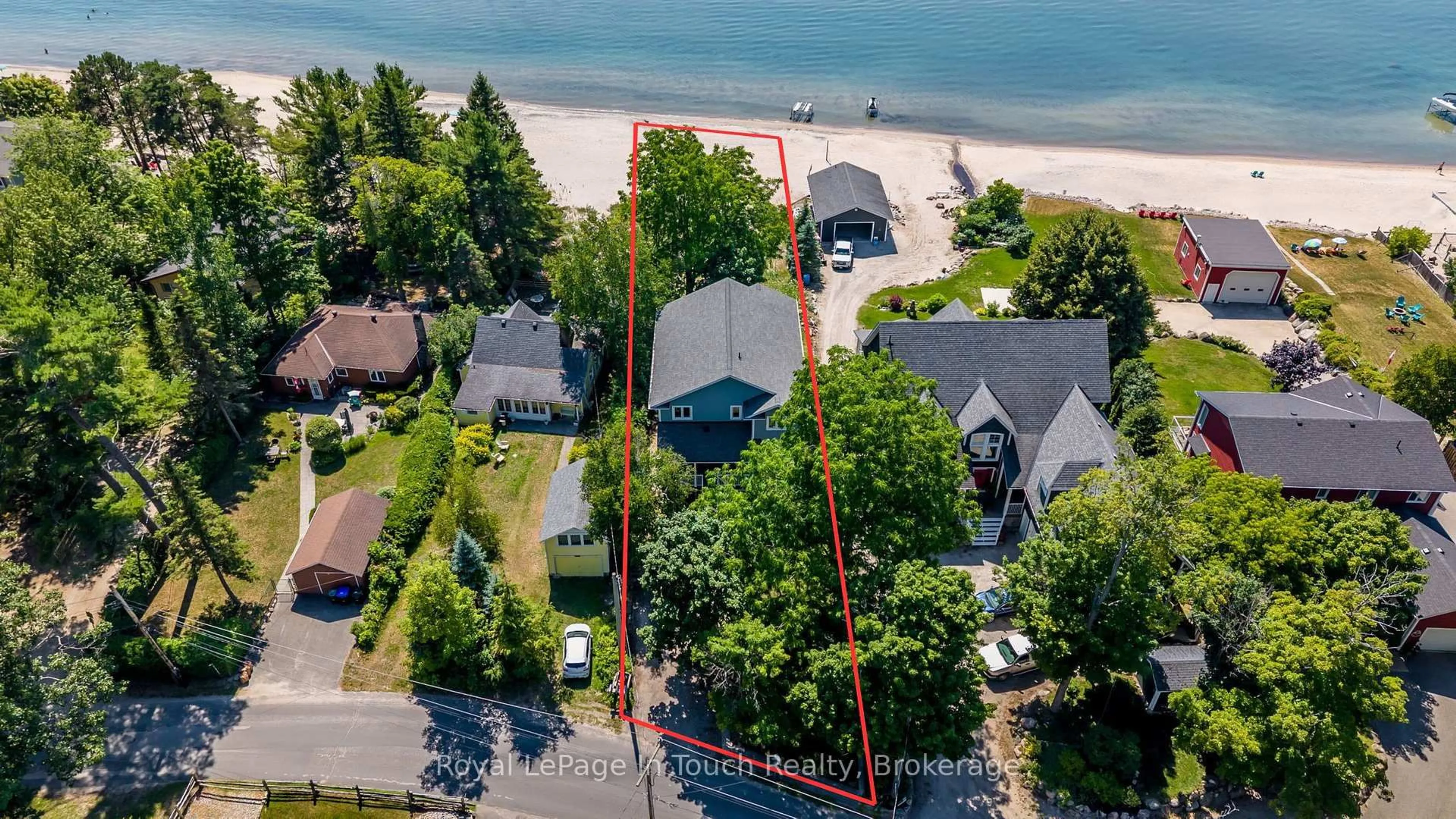 A pic from outside/outdoor area/front of a property/back of a property/a pic from drone, water/lake/river/ocean view for 44 Tiny Beaches Rd, Tiny Ontario L0L 2J0