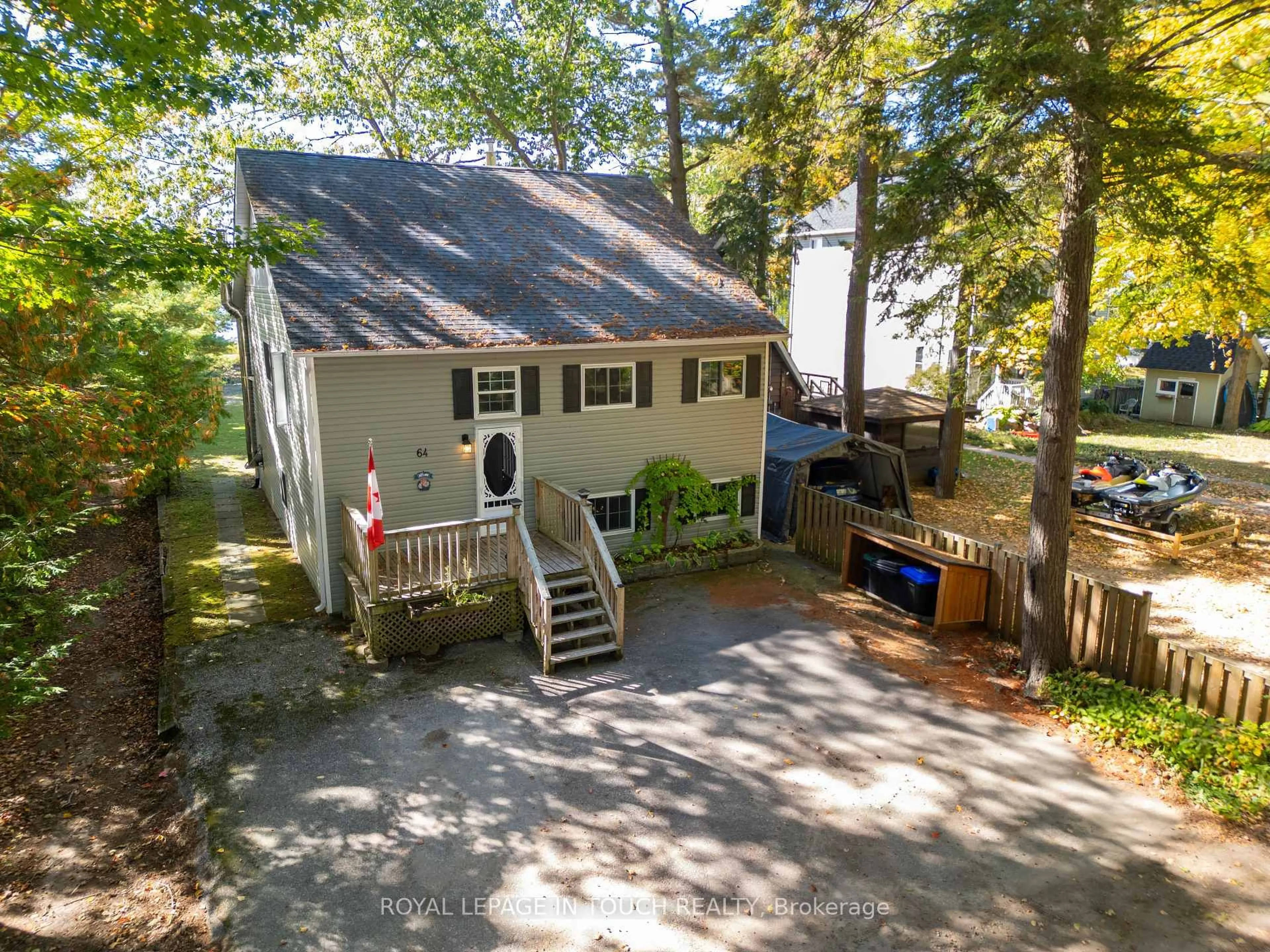 A pic from outside/outdoor area/front of a property/back of a property/a pic from drone, street for 64 Wahnekewening Dr, Tiny Ontario L0L 2J0