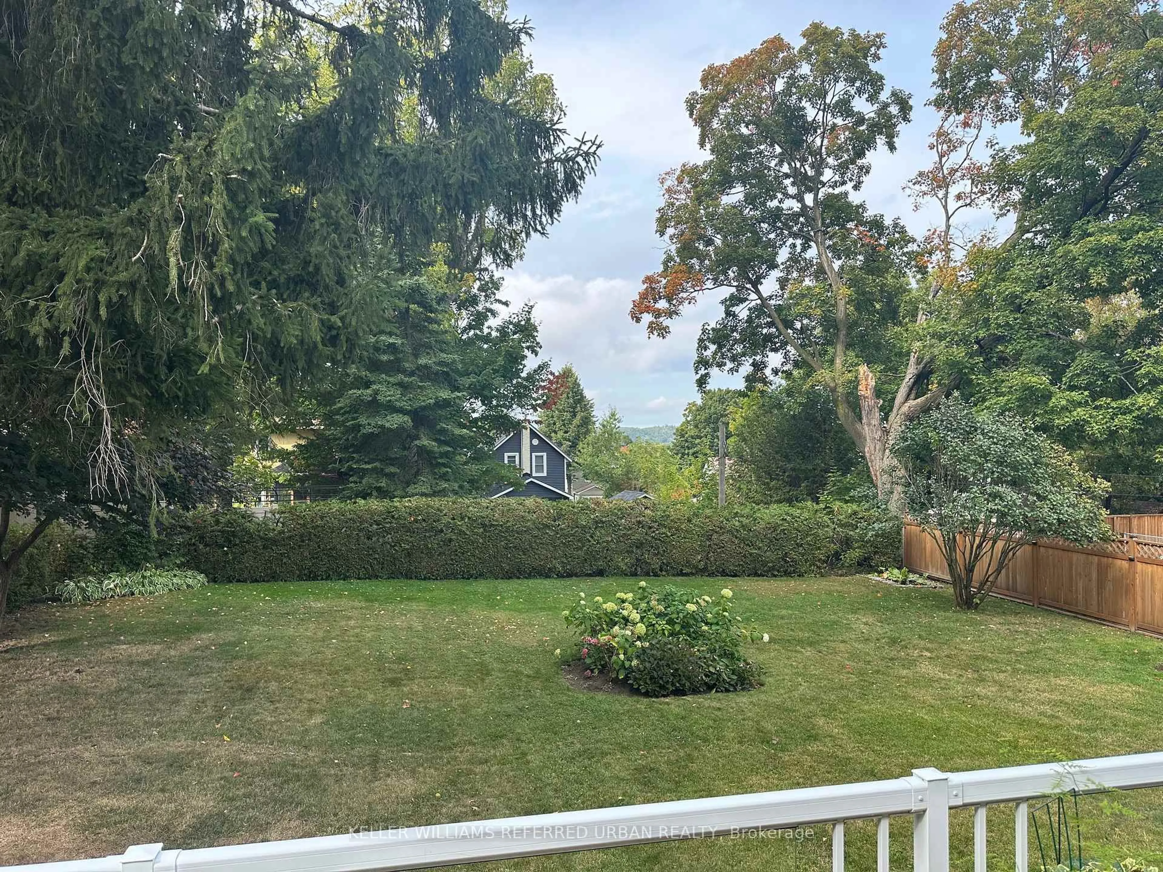 A pic from outside/outdoor area/front of a property/back of a property/a pic from drone, water/lake/river/ocean view for 650 Hugel Ave, Midland Ontario L4R 1W7