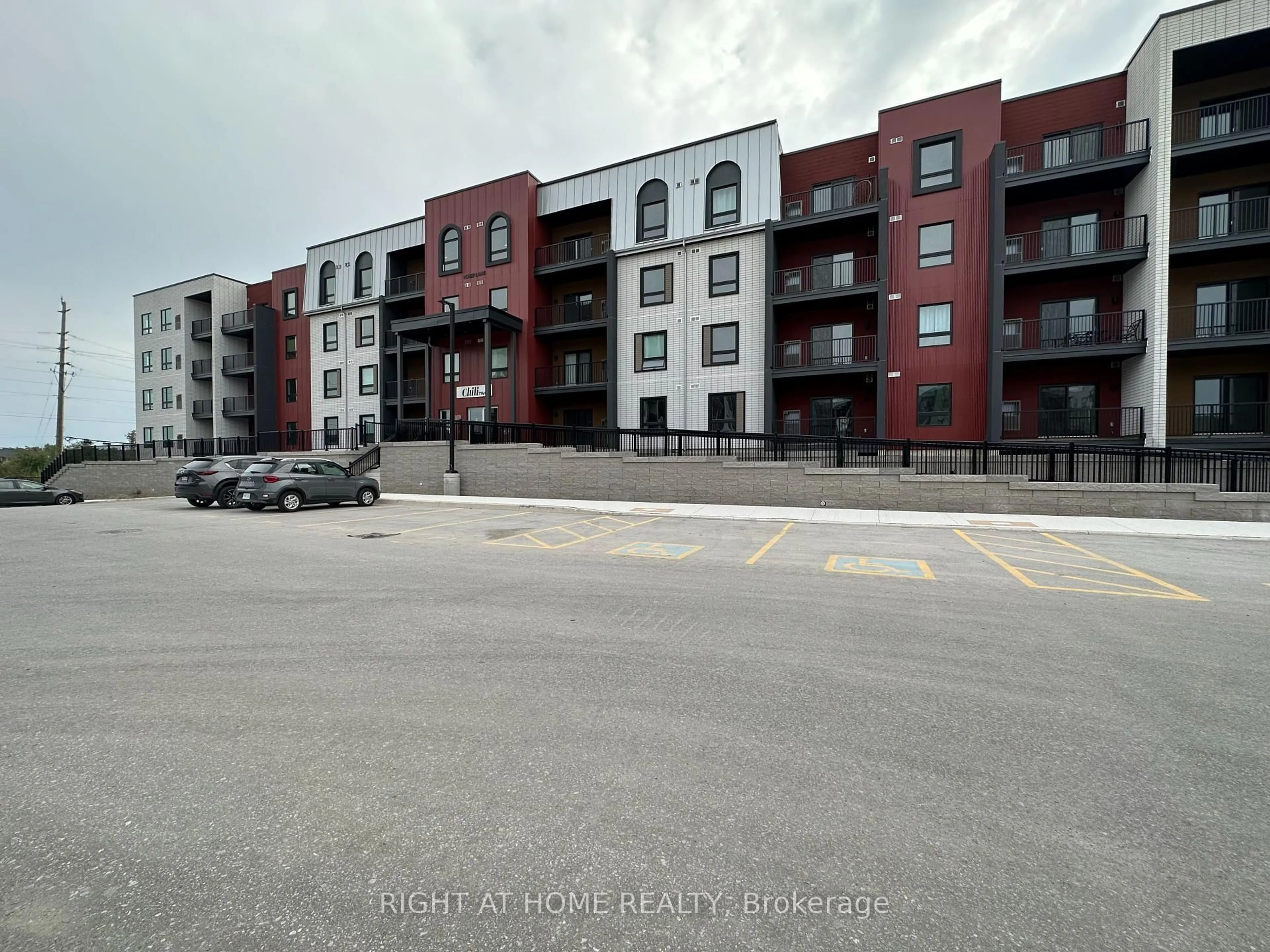 A pic from outside/outdoor area/front of a property/back of a property/a pic from drone, street for 1 Chef Lane #314, Barrie Ontario L9J 0T1