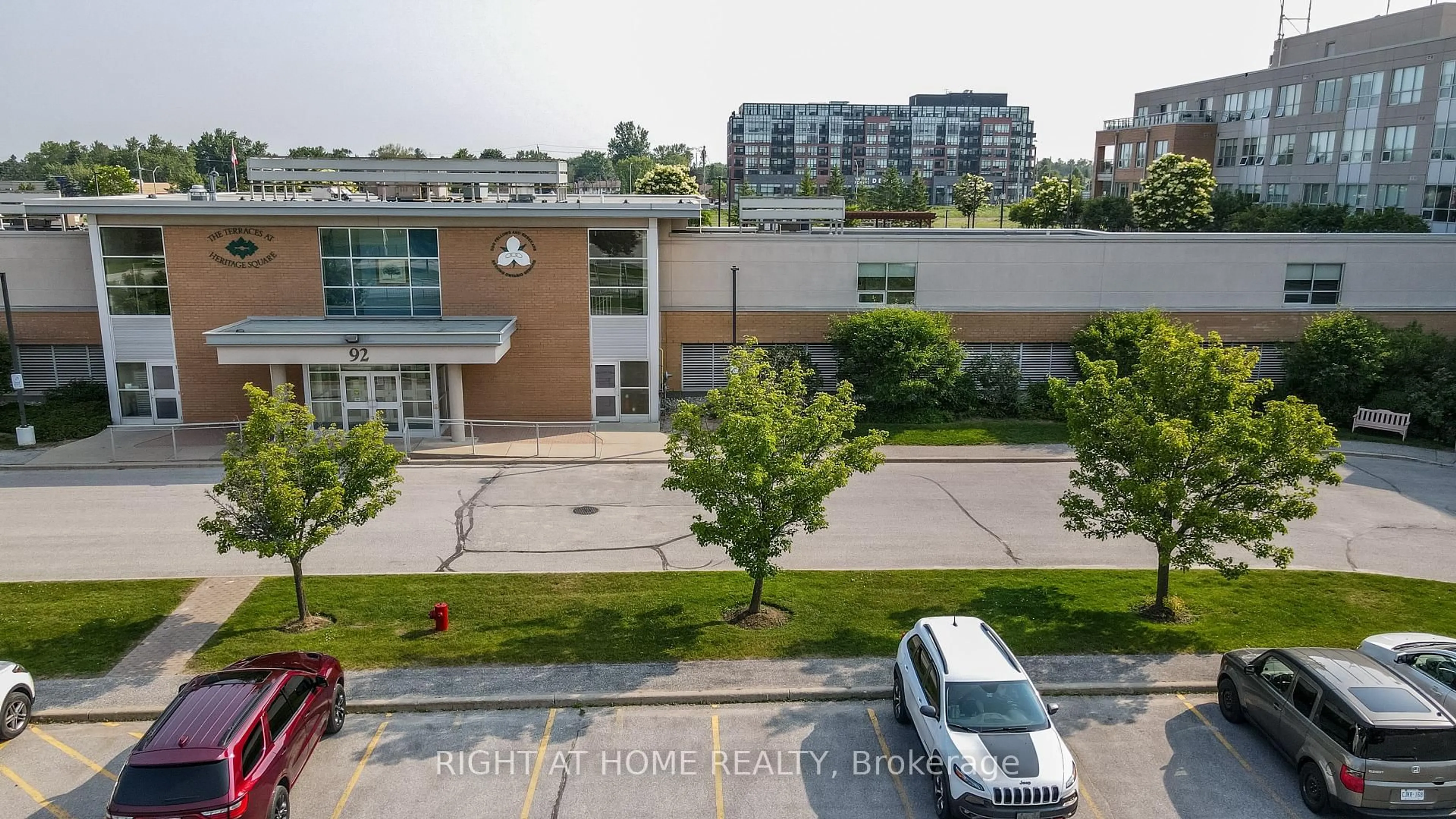 A pic from outside/outdoor area/front of a property/back of a property/a pic from drone, unknown for 90 Dean Ave #101, Barrie Ontario L4N 0M3