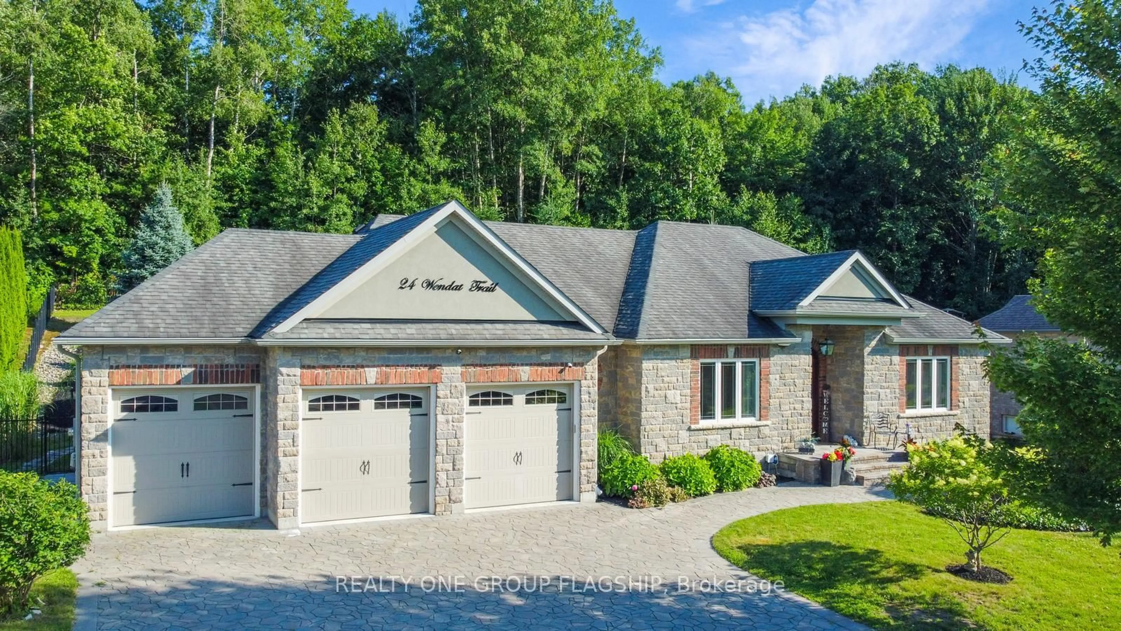 Home with brick exterior material, street for 24 Wendat Tr, Springwater Ontario L4M 6T4