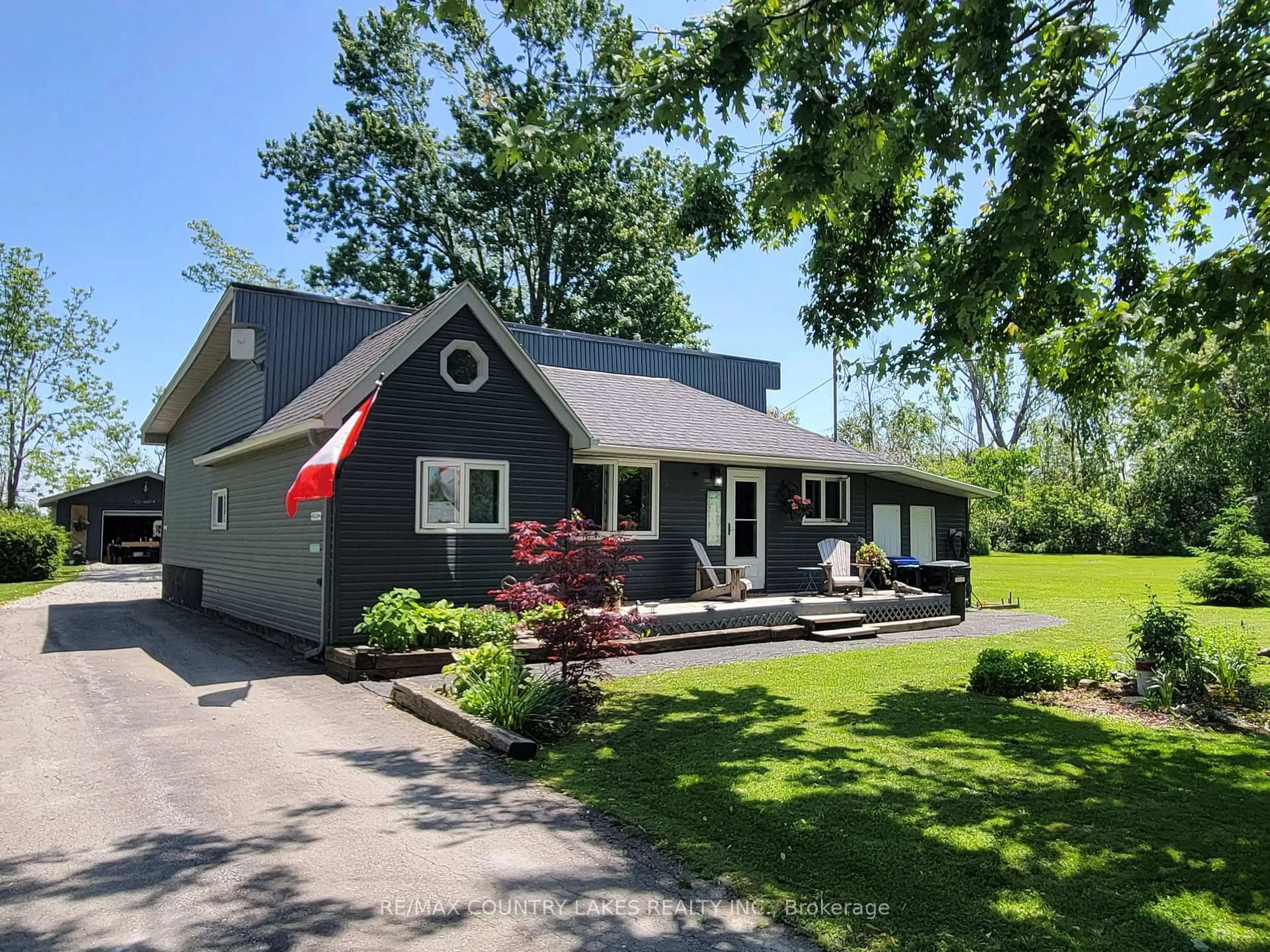Home with vinyl exterior material, street for 2481 Lakeshore Dr, Ramara Ontario L0K 1B0