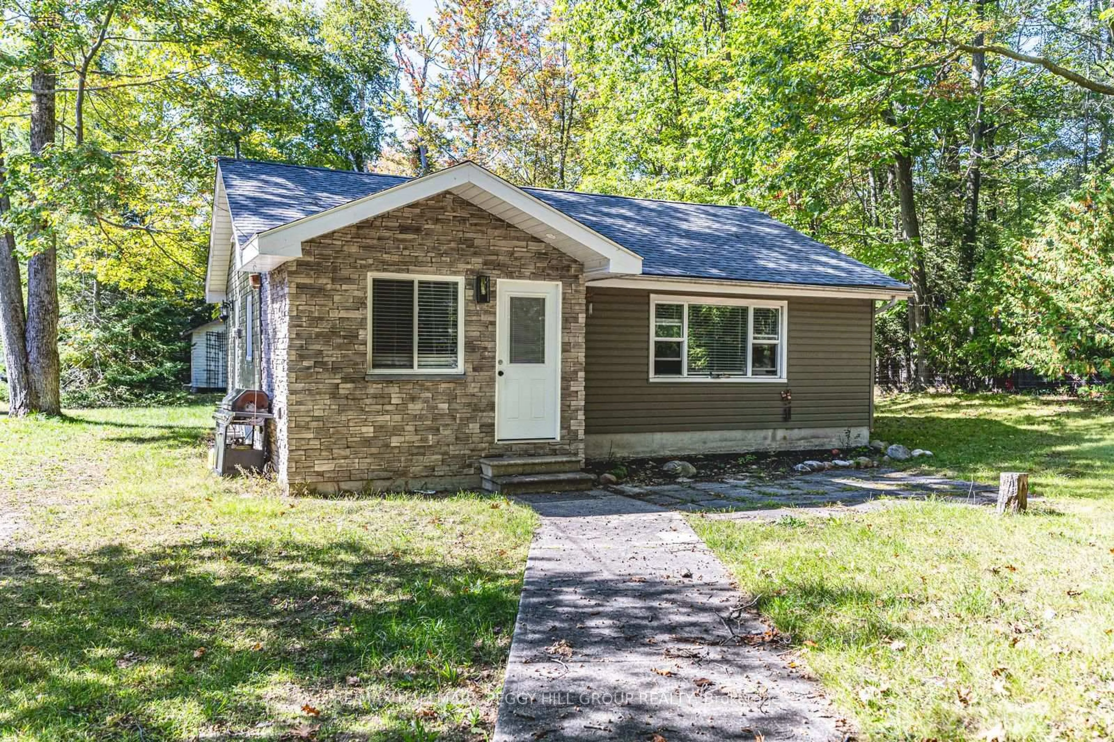 Home with vinyl exterior material, street for 12 Doan Ave, Tiny Ontario L0L 1P0