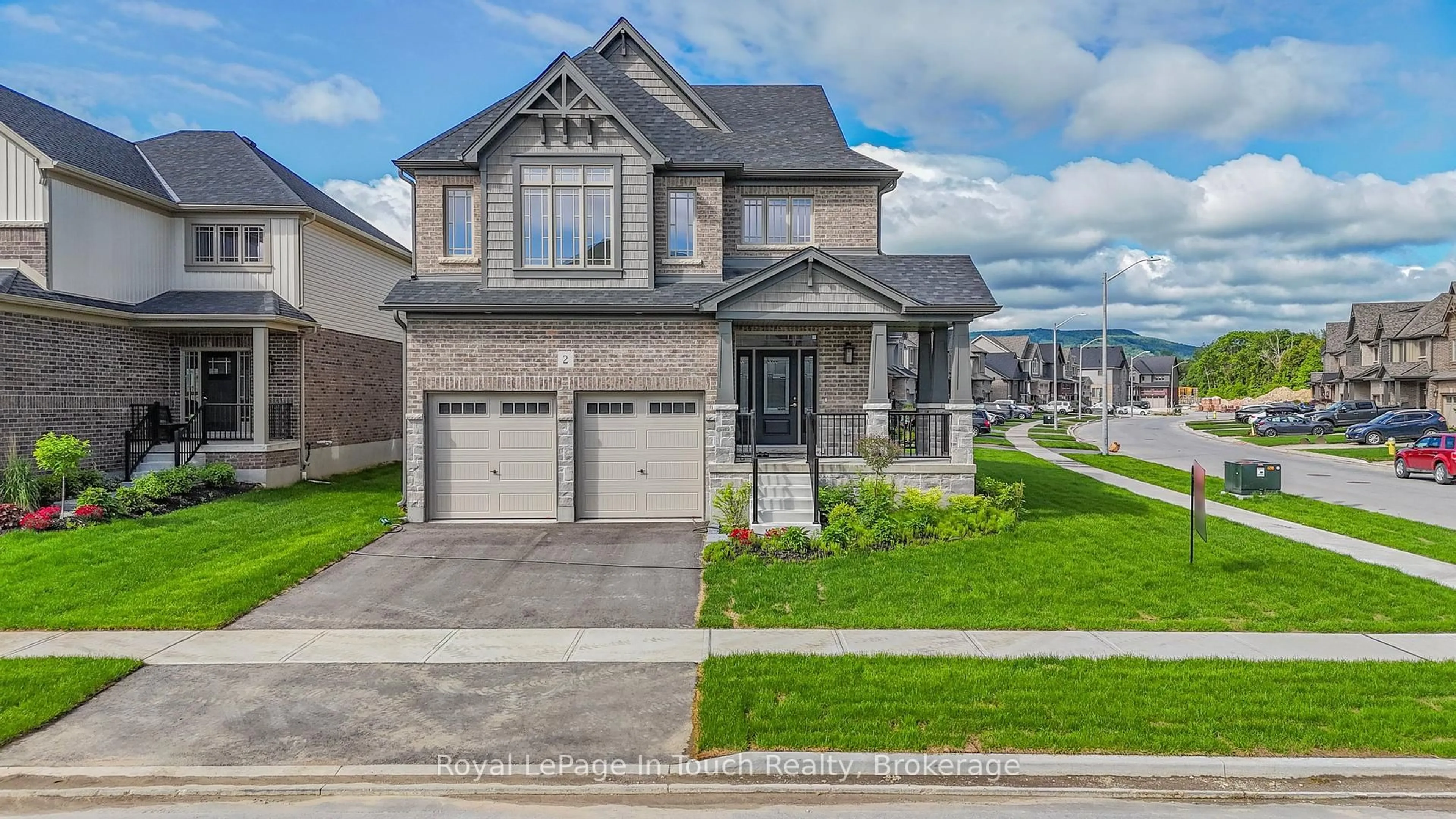 Home with brick exterior material, street for 2 ROWLAND St, Collingwood Ontario L9Y 5M4